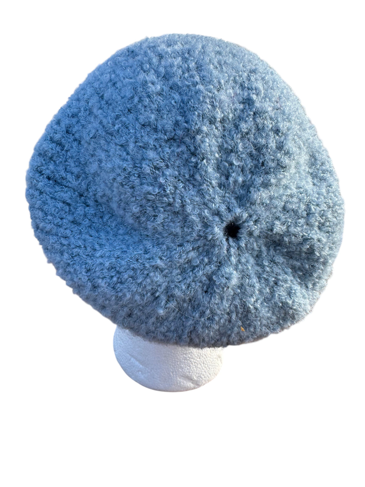 Oak Crest Alpacas and More hand-knit blue alpaca boucle textured hat on a display stand