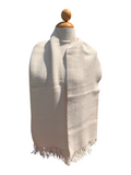 Oak Crest Alpacas and More white woven baby alpaca scarf with fringe detail on a mannequin