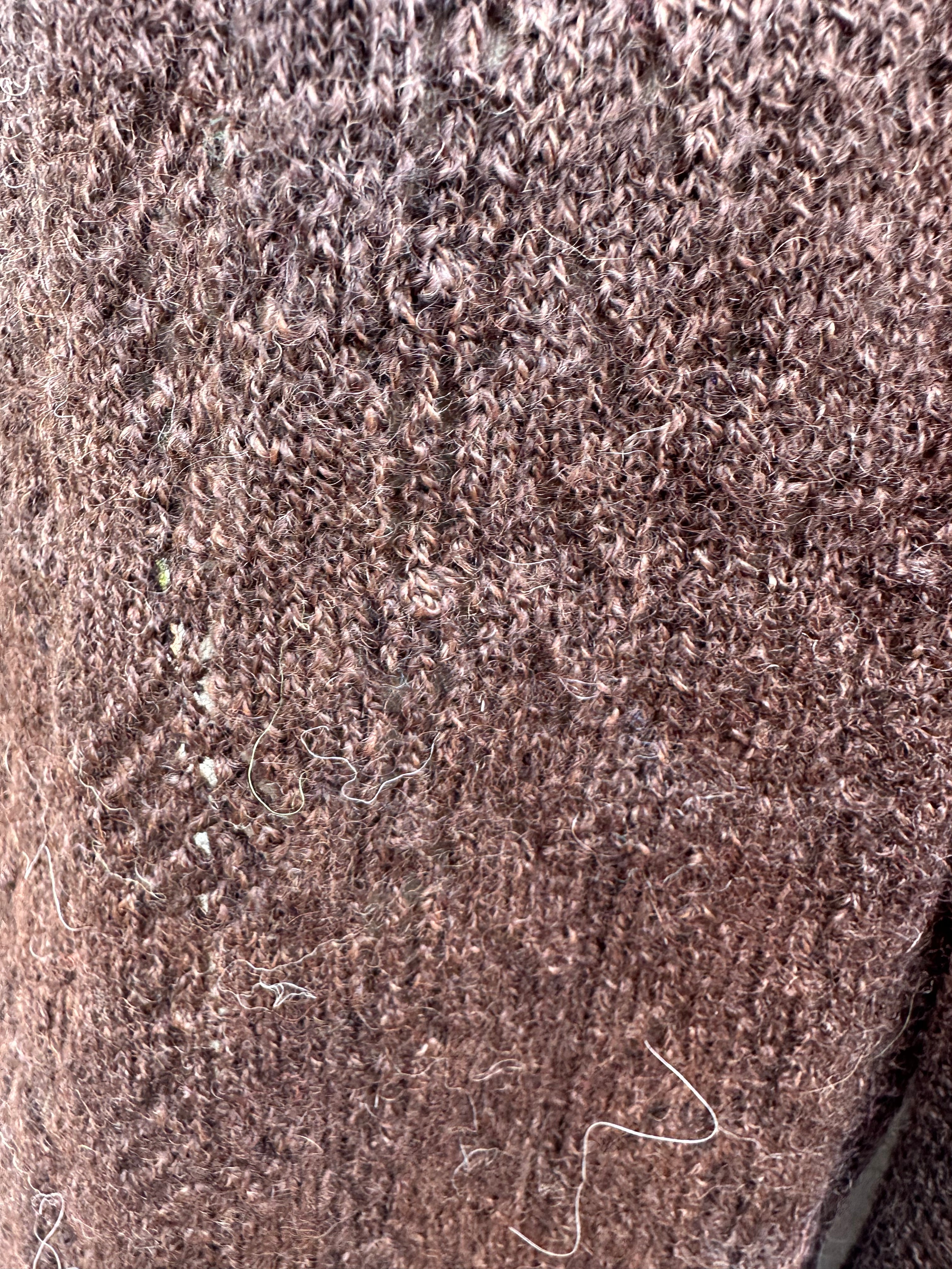 100% USA Alpaca machine knit scarf. Very soft and warm.