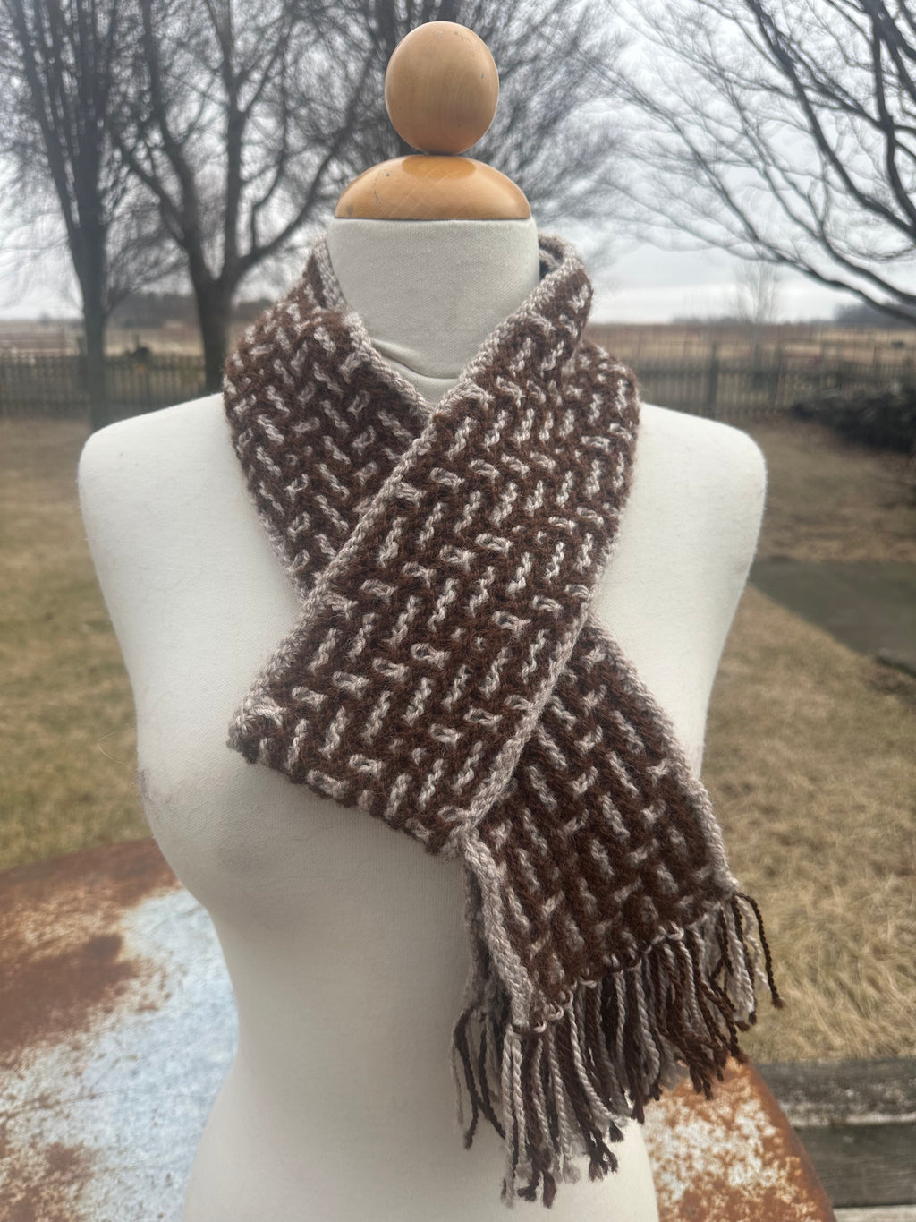 100% USA Alpaca hand knit scarf. Very soft and warm.