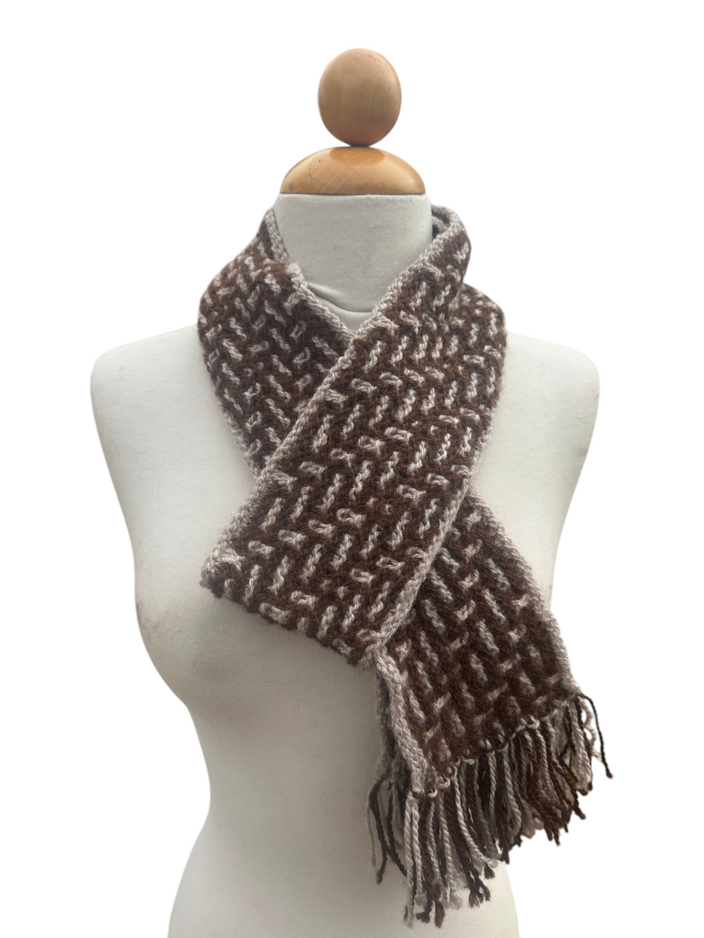 Oak Crest Alpacas and More hand knit brown and beige alpaca wool scarf with fringe on a mannequin