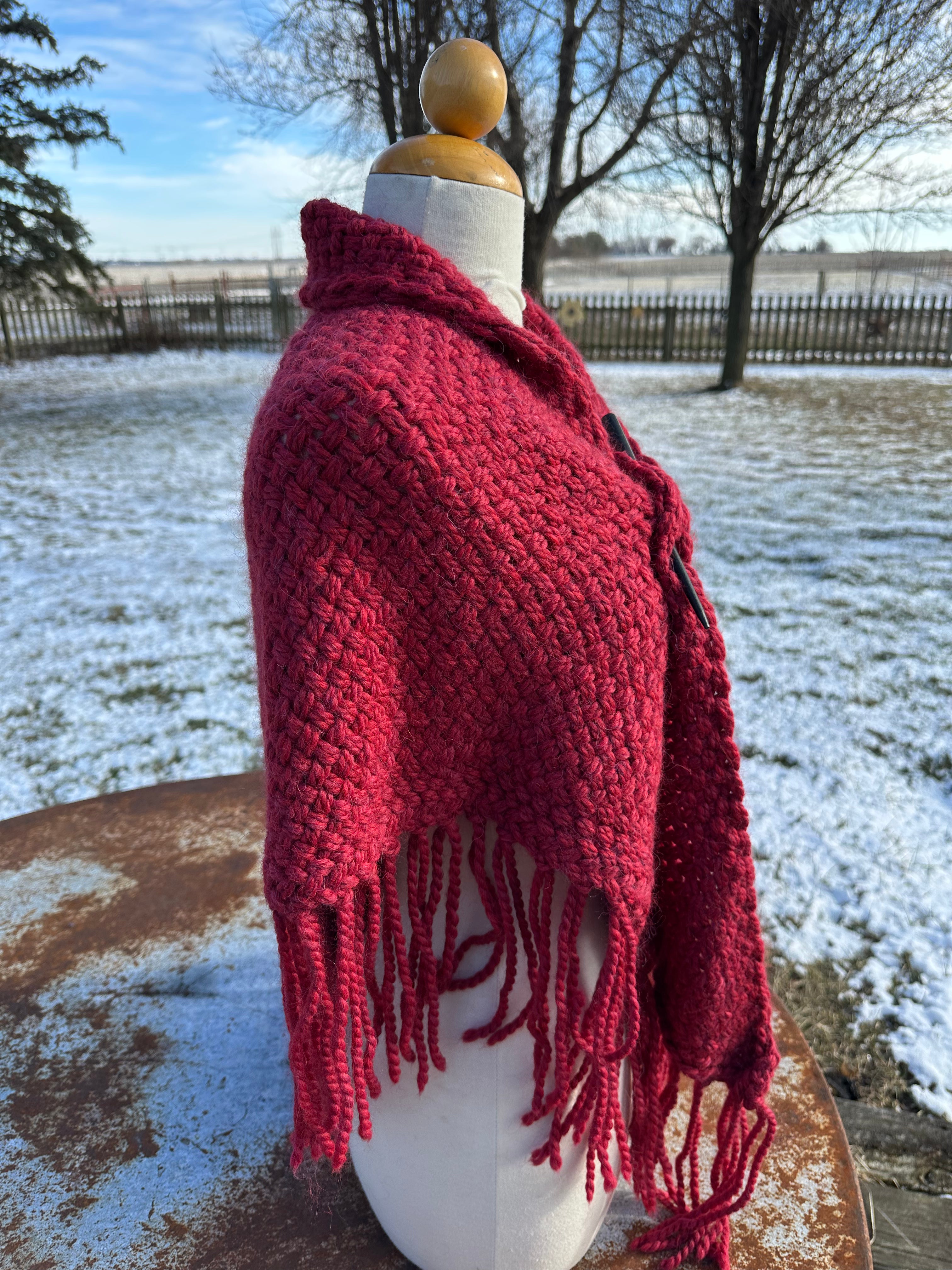 100% Alpaca hand woven shawl with fringe. Very soft and warm.