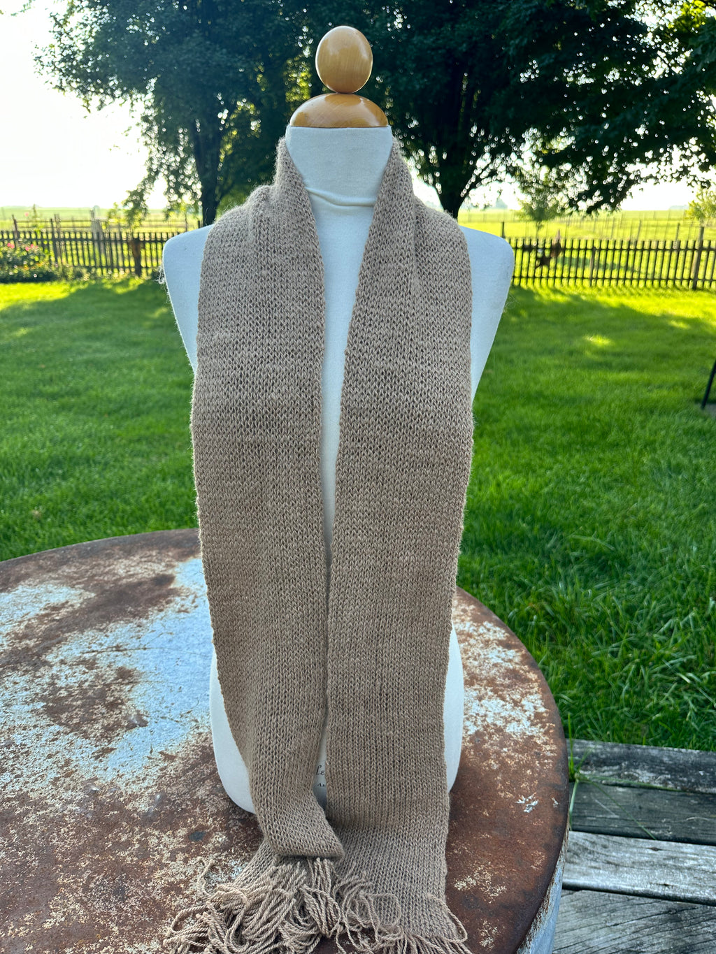 100% USA Alpaca knit scarf. Very soft and warm.