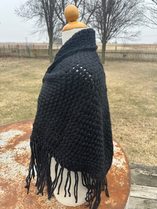 100% Alpaca hand woven shawl with fringe. Very soft and warm.