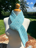 100% USA Alpaca hand knit scarf. Very soft and warm.