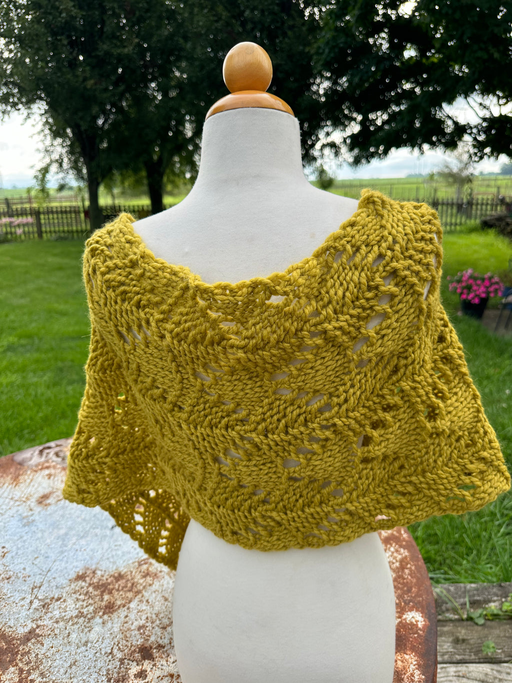 Hand knit Llama poncho/wrap. One size fits all.