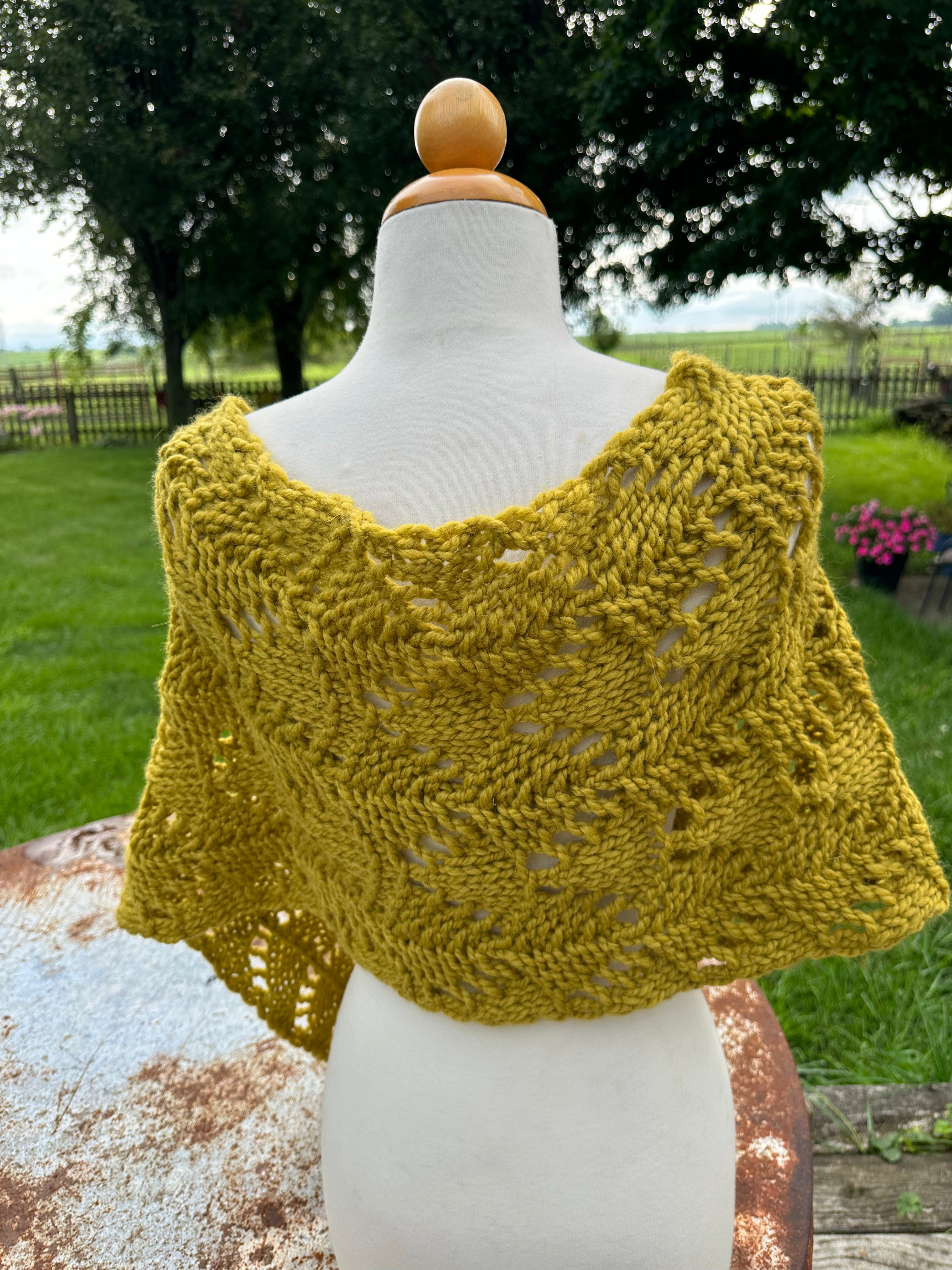 Hand knit Llama poncho/wrap. One size fits all.