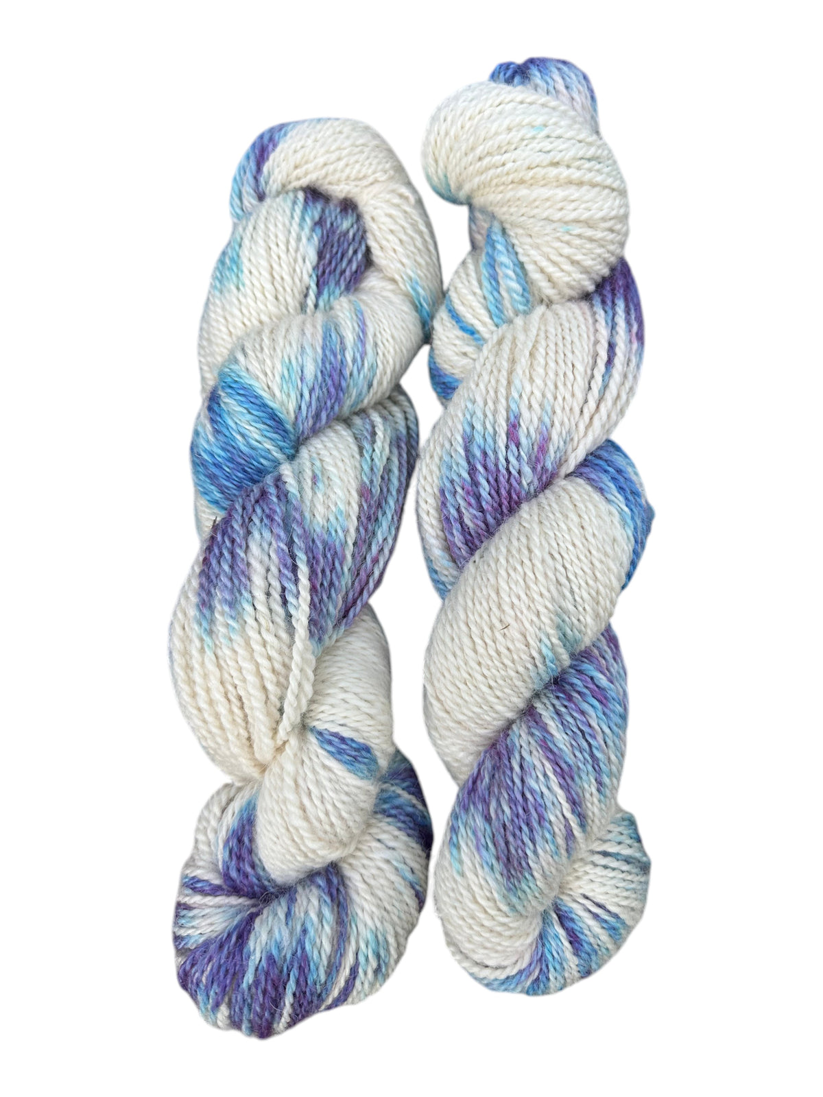Oak Crest Alpacas and More 100% American alpaca yarn in a soft white base with variegated blue and purple hand-dye.
