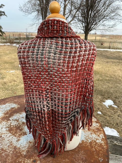 100% Alpaca hand woven shawl with fringe. Very soft and warm.