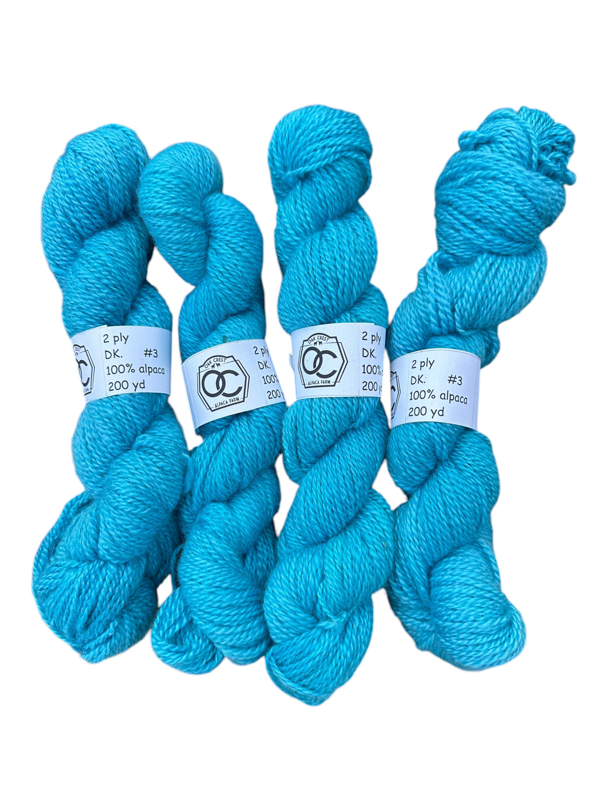 Oak Crest Alpacas and More hand dyed bright turquoise 100% American alpaca DK weight yarn skeins
