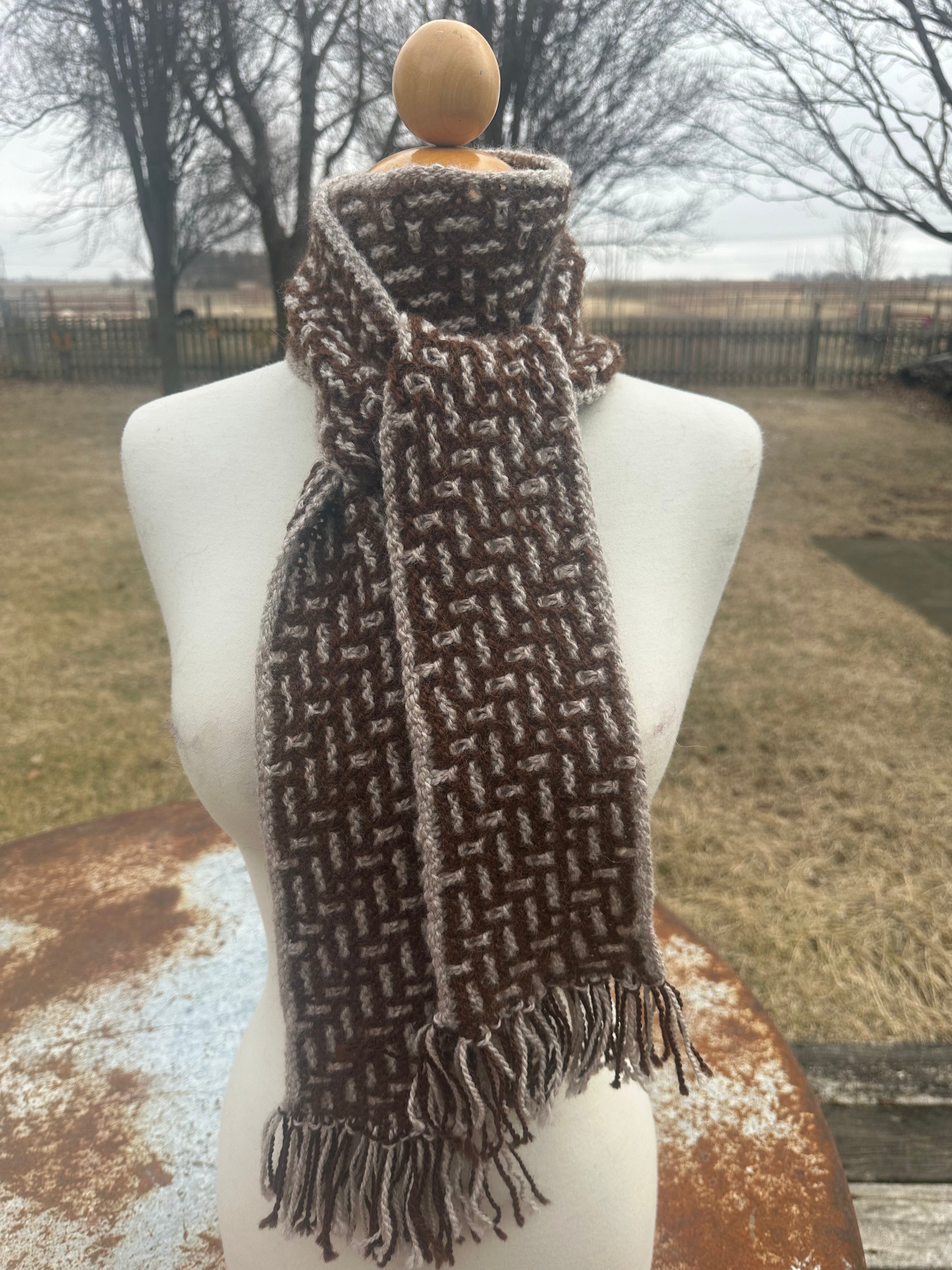 100% USA Alpaca hand knit scarf. Very soft and warm.