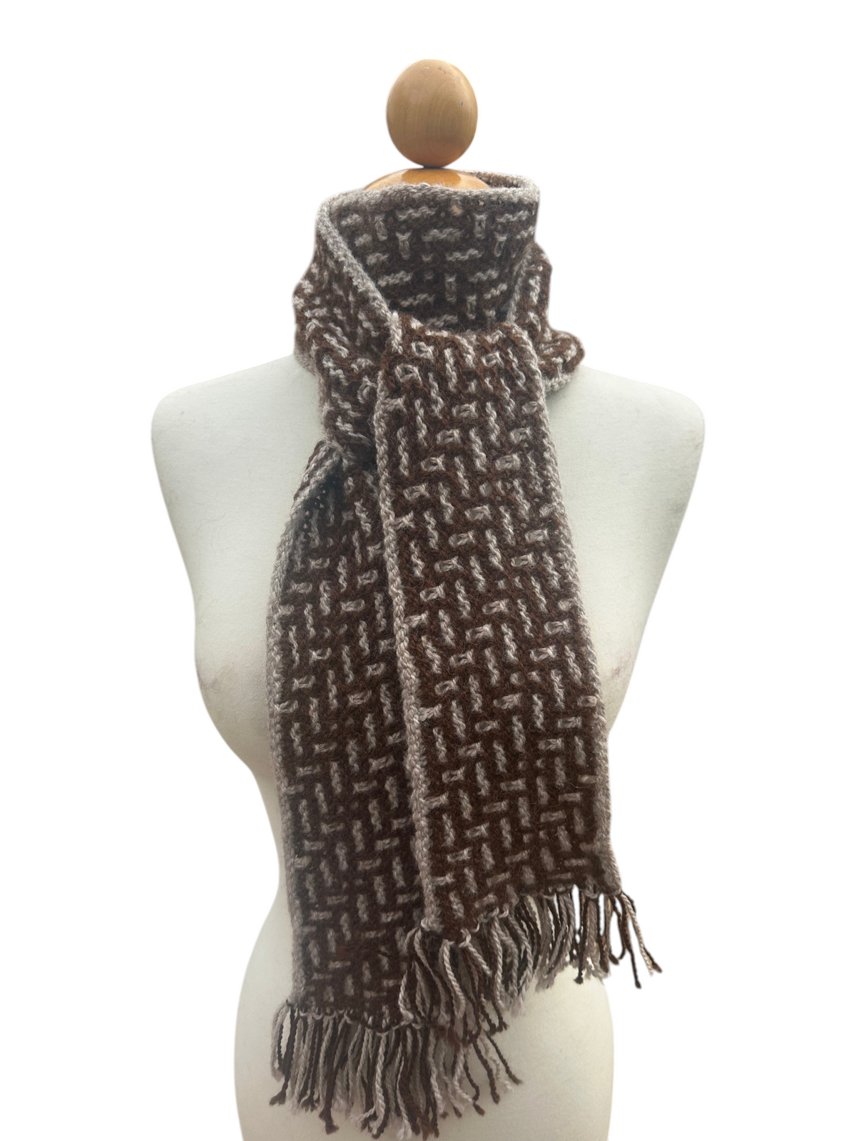 Oak Crest Alpacas and More hand knit brown and grey alpaca wool scarf with fringe on a mannequin
