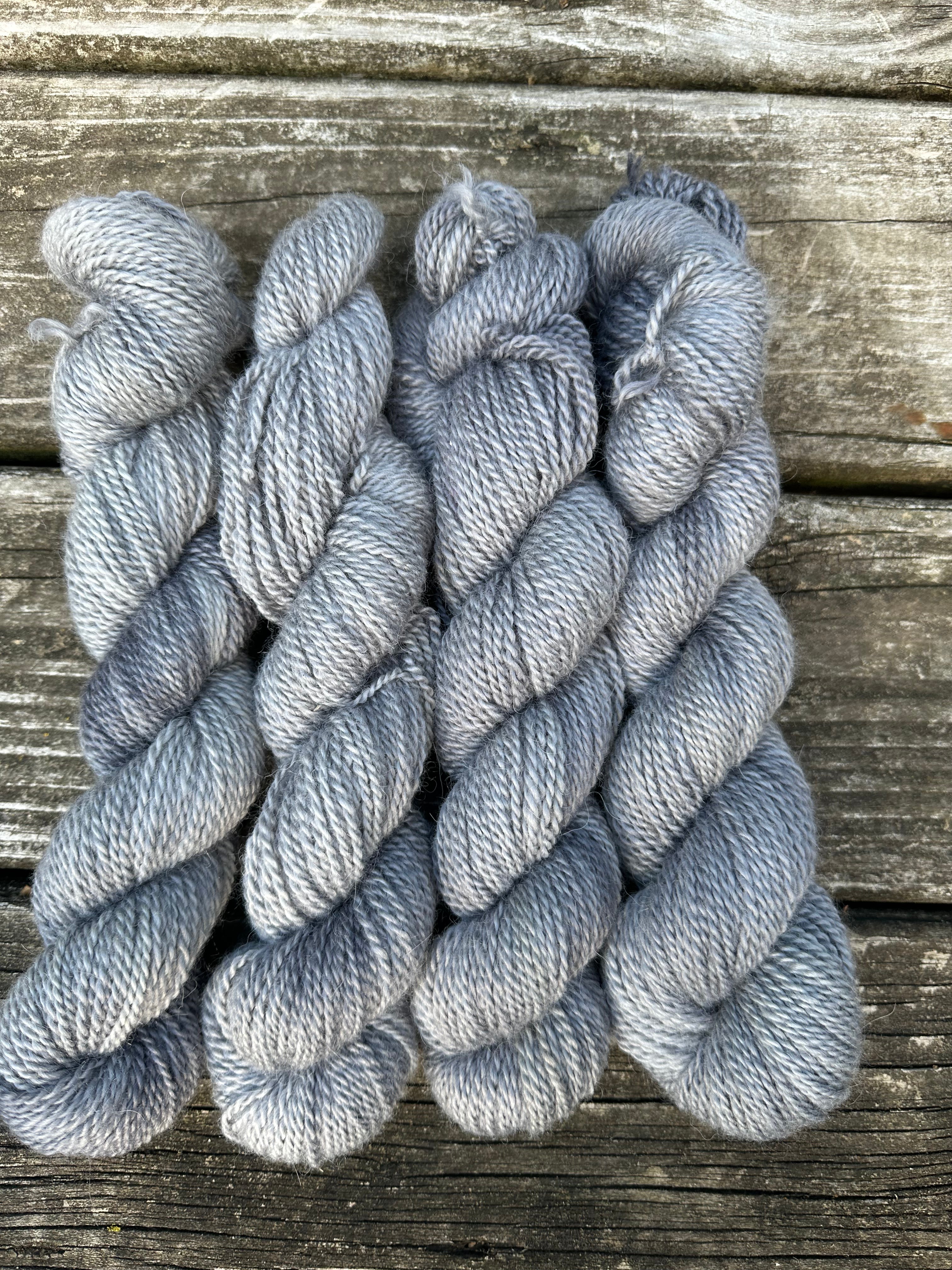 150 yd of Worsted weight 100%  American Alpaca yarn, 2 ply, from our alpacas. Hand dyed.