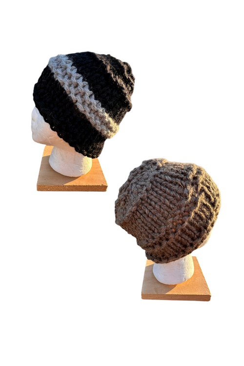 Oak Crest Alpacas and More hand-knit chunky alpaca hats in black with grey stripe and solid brown on mannequin heads.