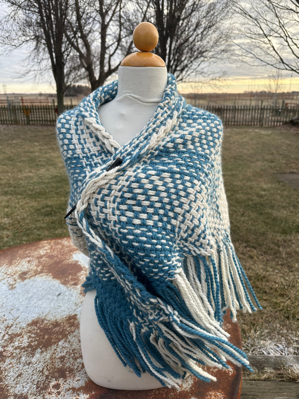 100% Alpaca hand woven shawl with fringe. Very soft and warm.