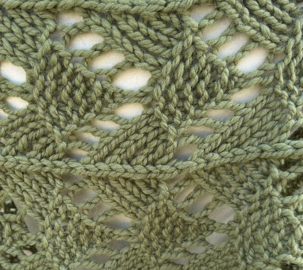 Hand knit Llama poncho/wrap. One size fits all.