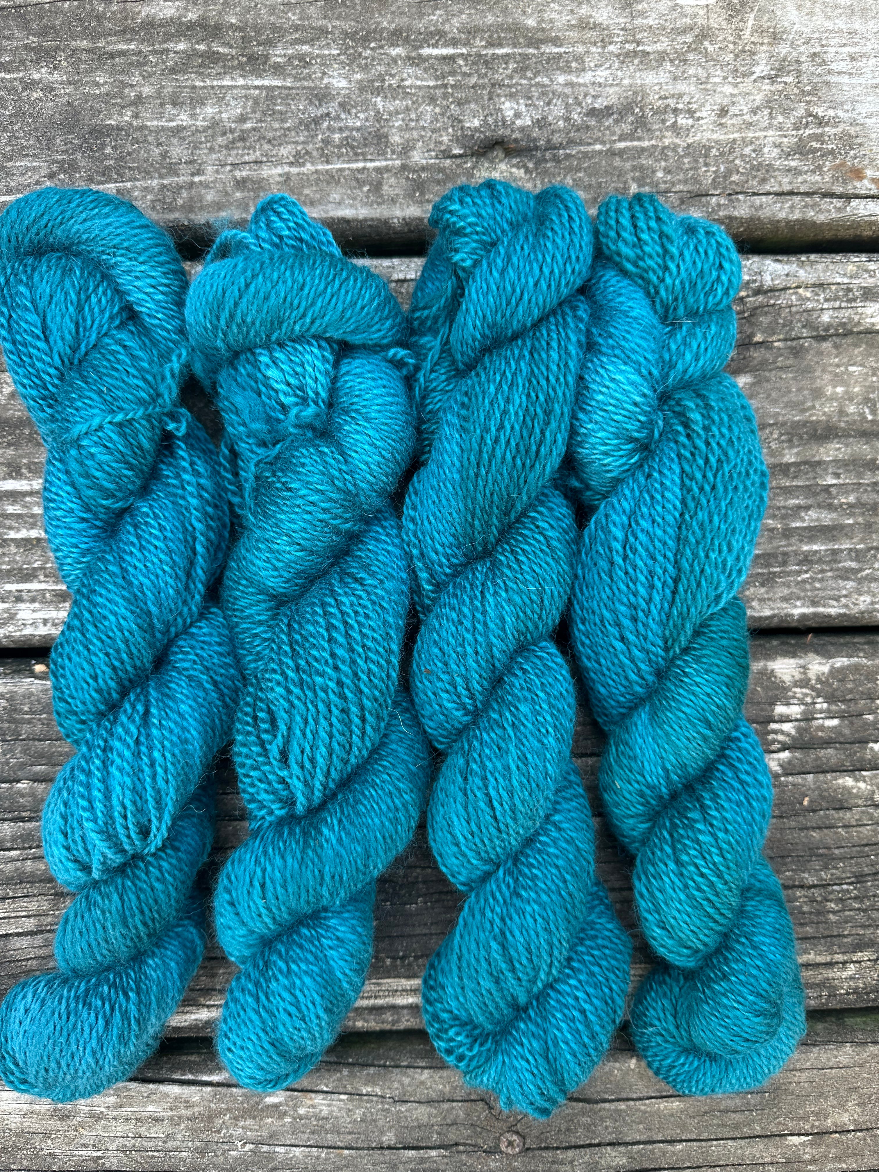 150 yd of Worsted weight 100%  American Alpaca yarn, 2 ply, from our alpacas. Hand dyed.