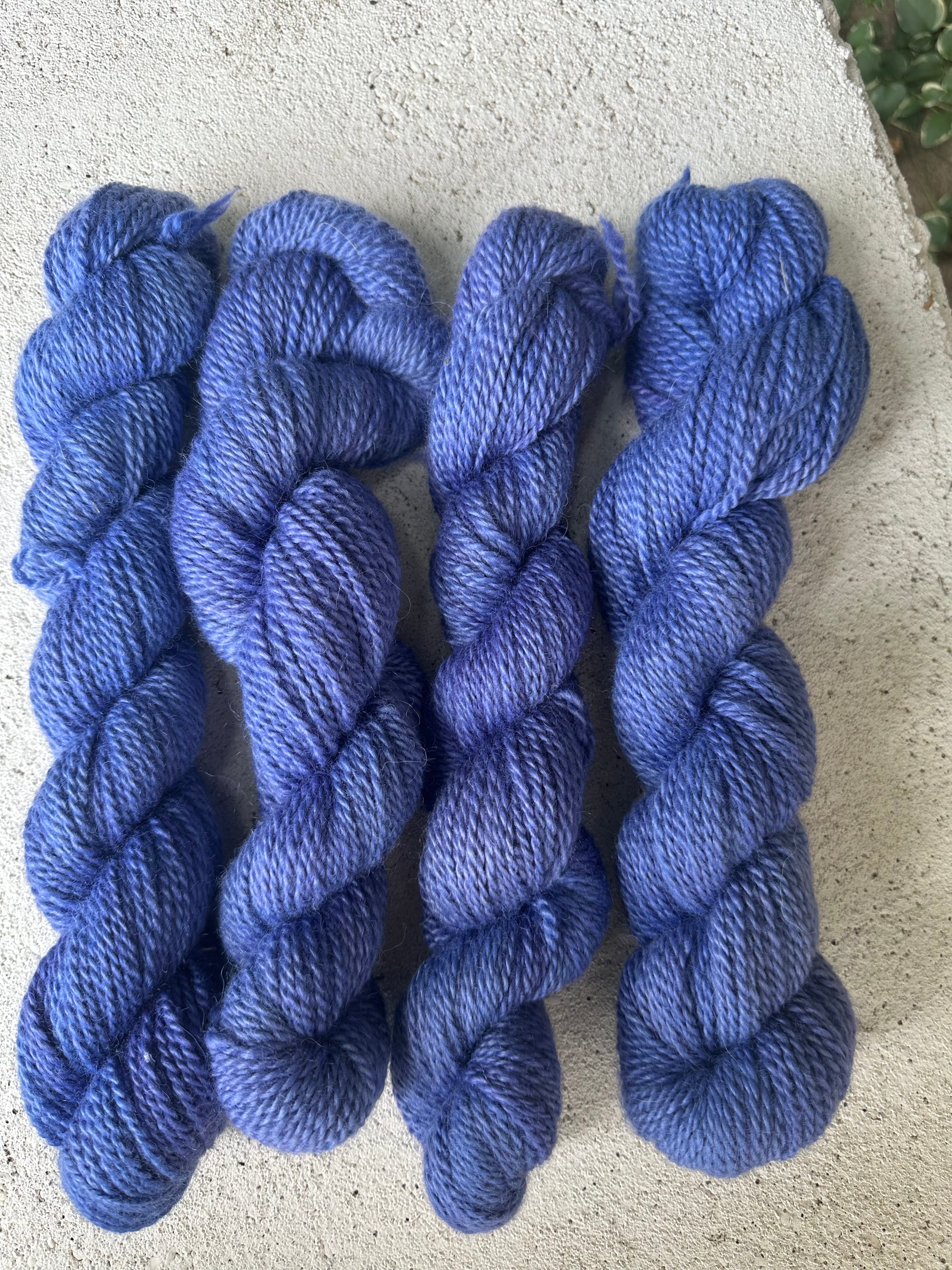 150 yd of Worsted weight 100%  American Alpaca yarn, 2 ply, from our alpacas. Hand dyed.