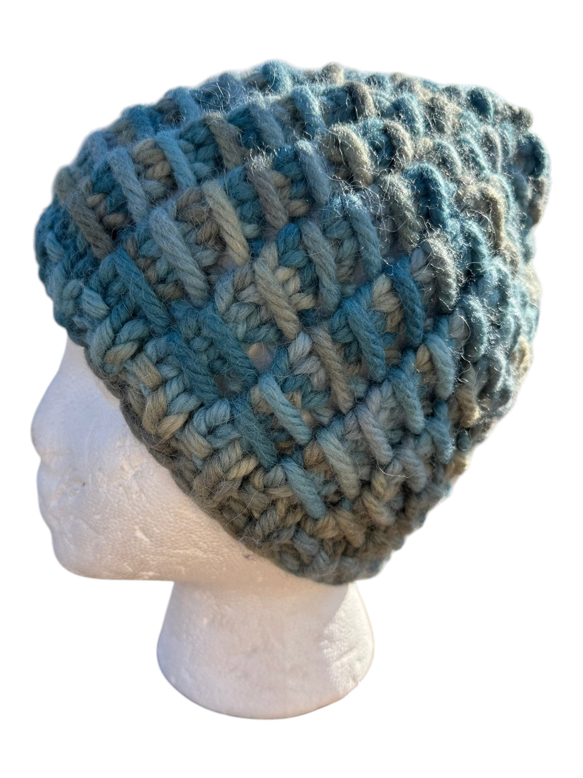 Oak Crest Alpacas and More chunky knit variegated teal wool and alpaca blend hat on a mannequin head