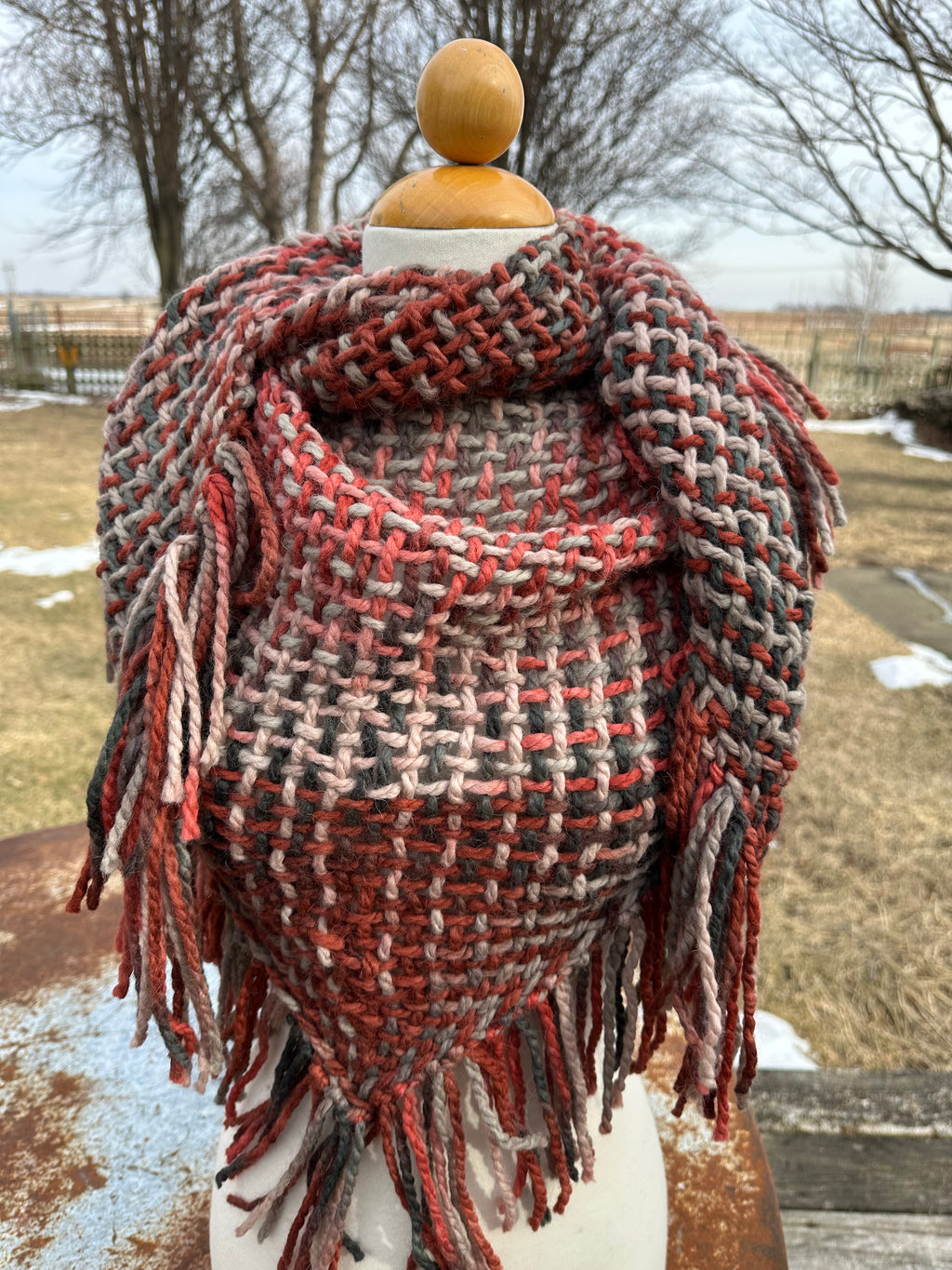 100% Alpaca hand woven shawl with fringe. Very soft and warm.