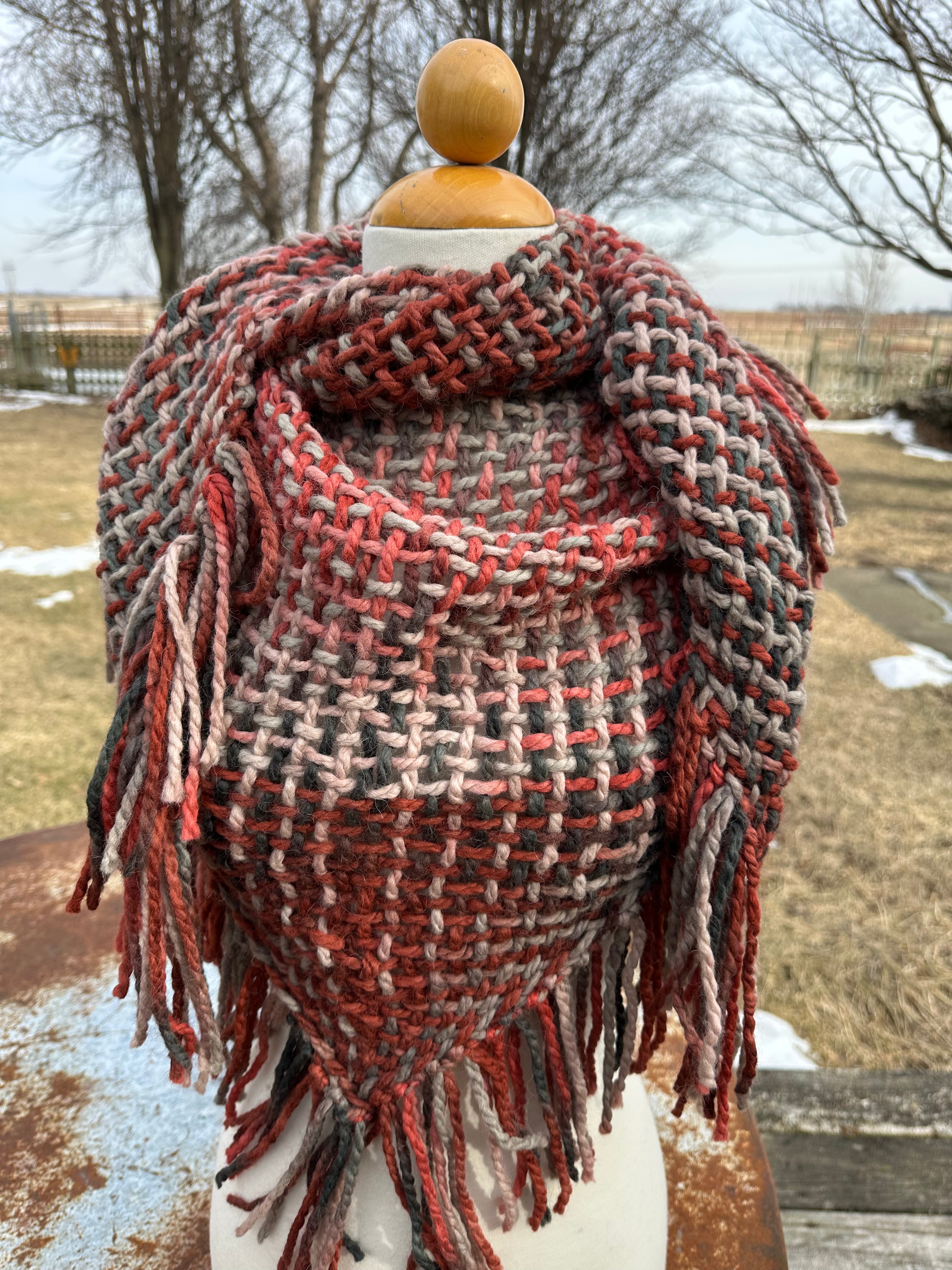100% Alpaca hand woven shawl with fringe. Very soft and warm.