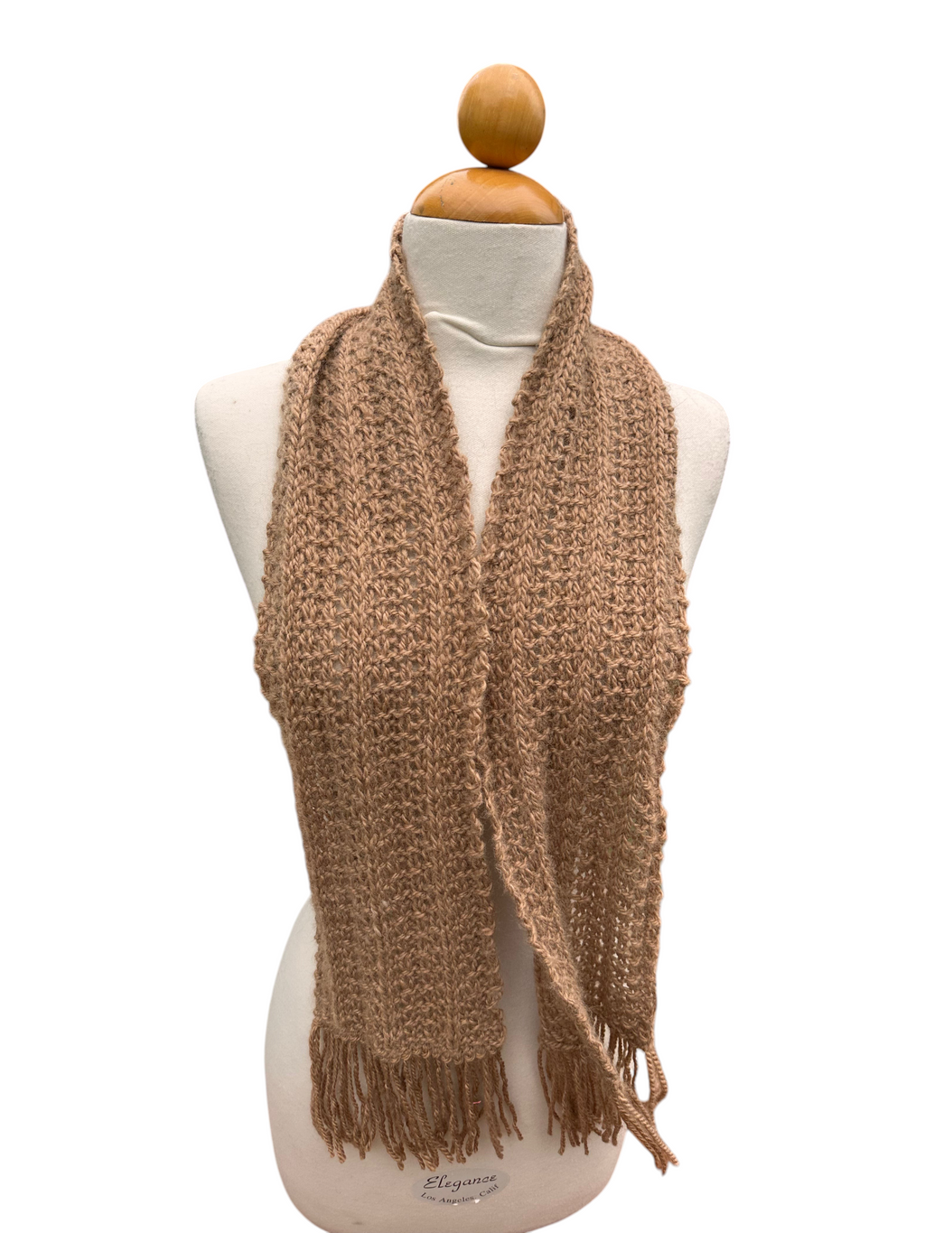 Oak Crest Alpacas and More hand knit tan alpaca scarf with fringe on a mannequin