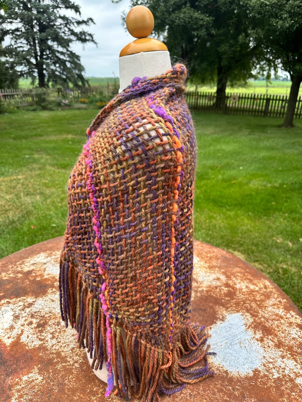 100% Alpaca hand woven shawl with fringe. Very soft and warm.