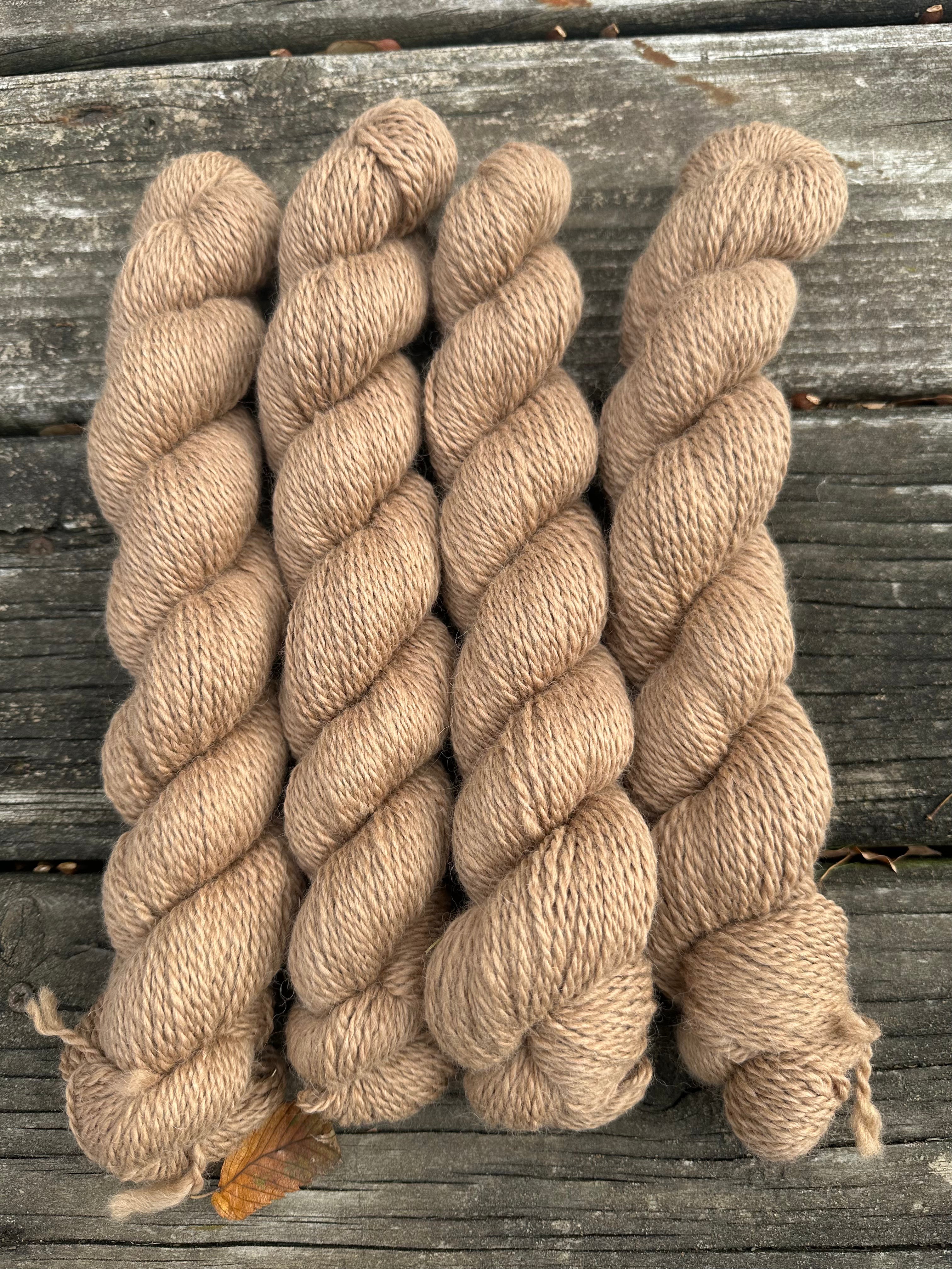 200 yd of DK 100% USA Alpaca from our alpacas, 2 ply.  Natural Colors
