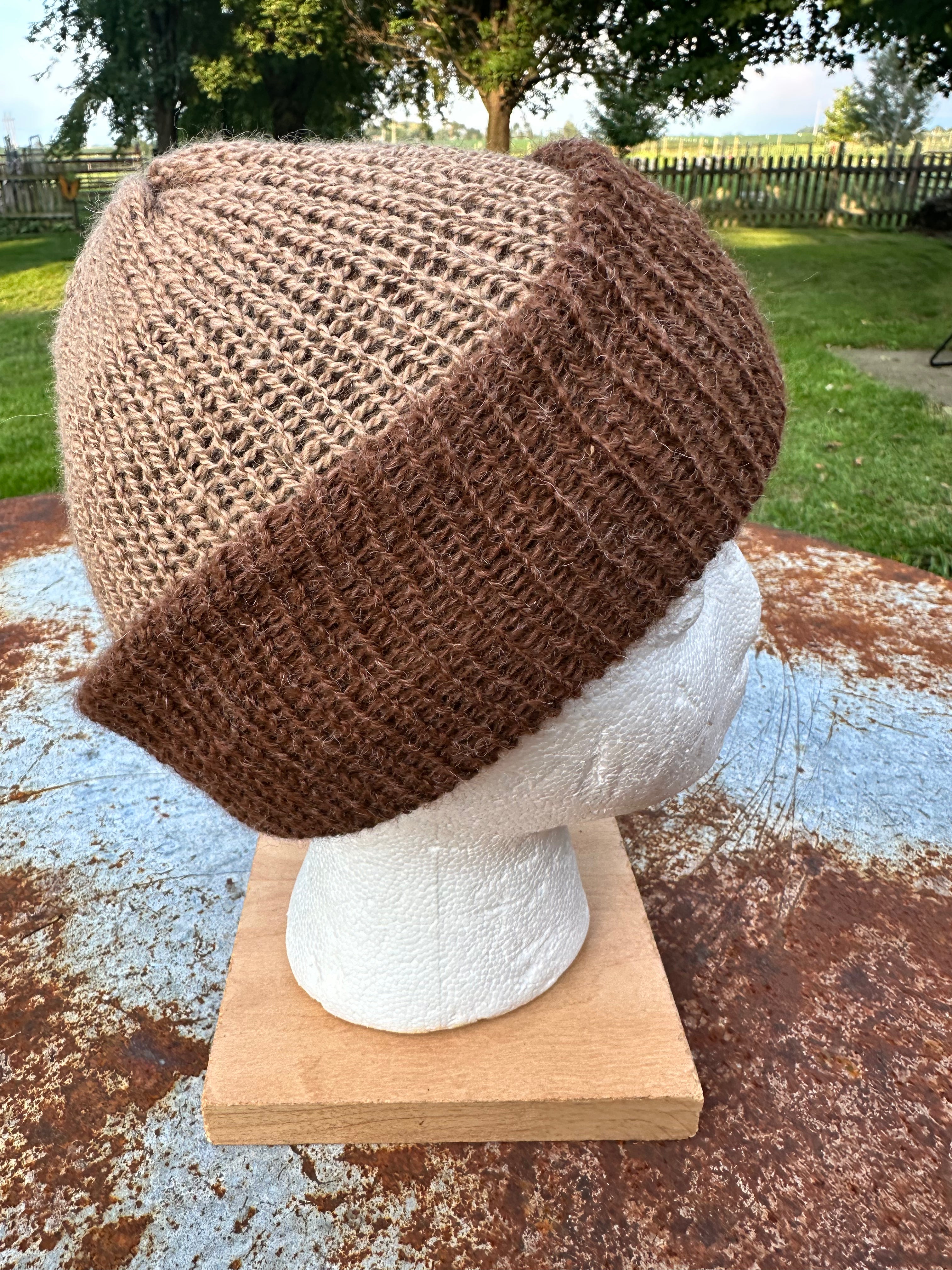 Lightweight double knit Alpaca hat with fold over brim. Reversible.