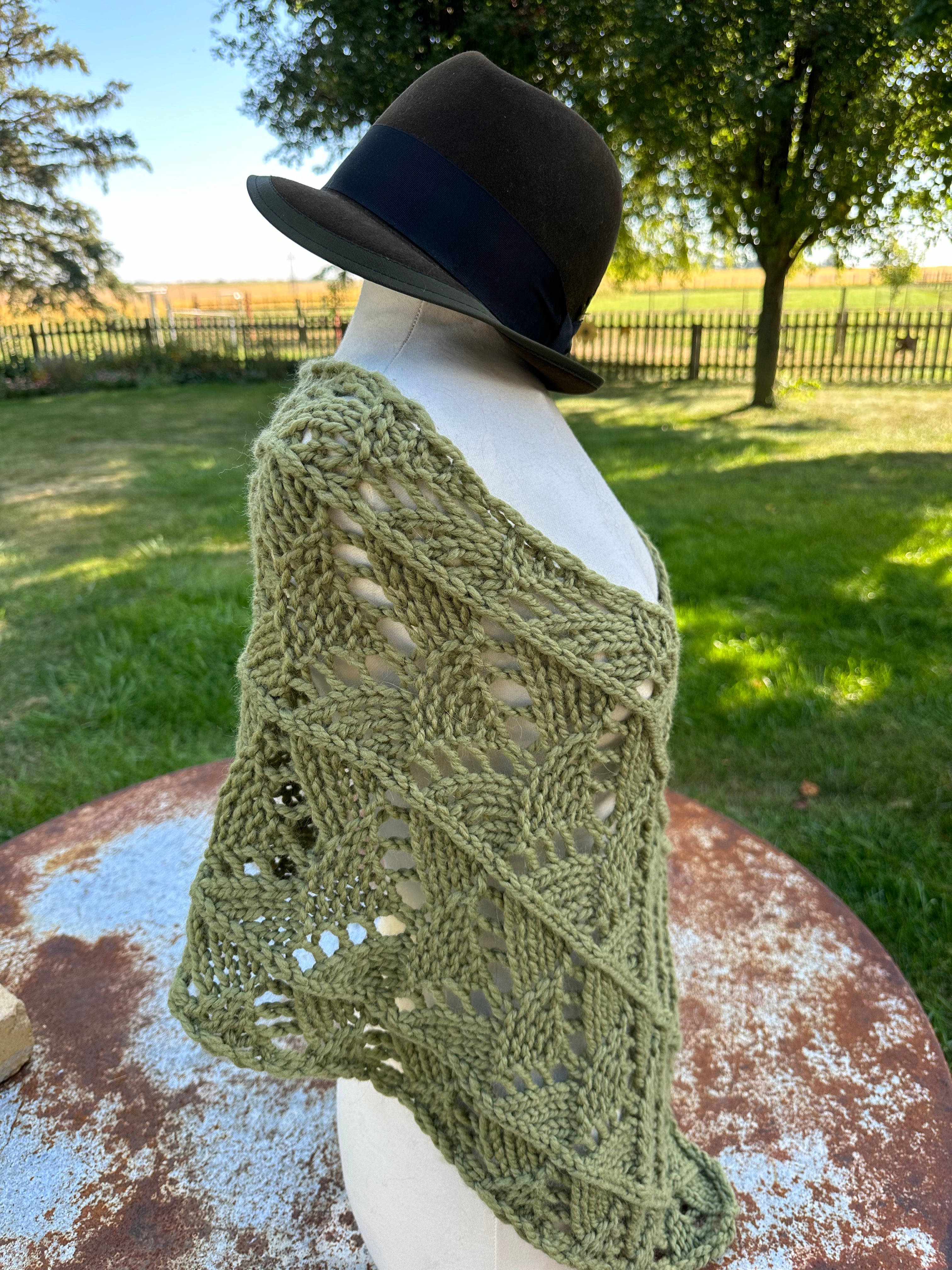 Hand knit Llama poncho/wrap. One size fits all.