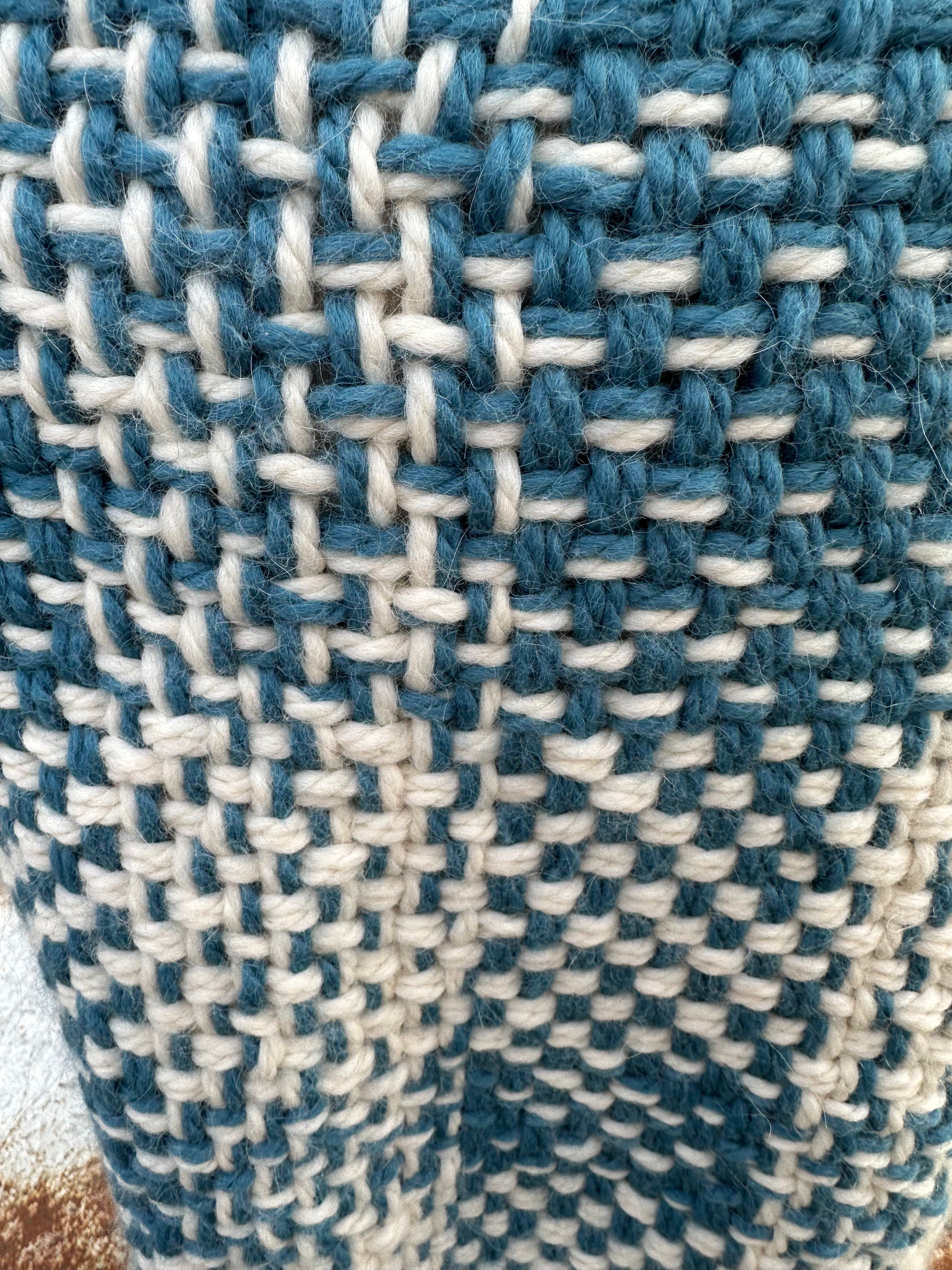 100% Alpaca hand woven shawl with fringe. Very soft and warm.