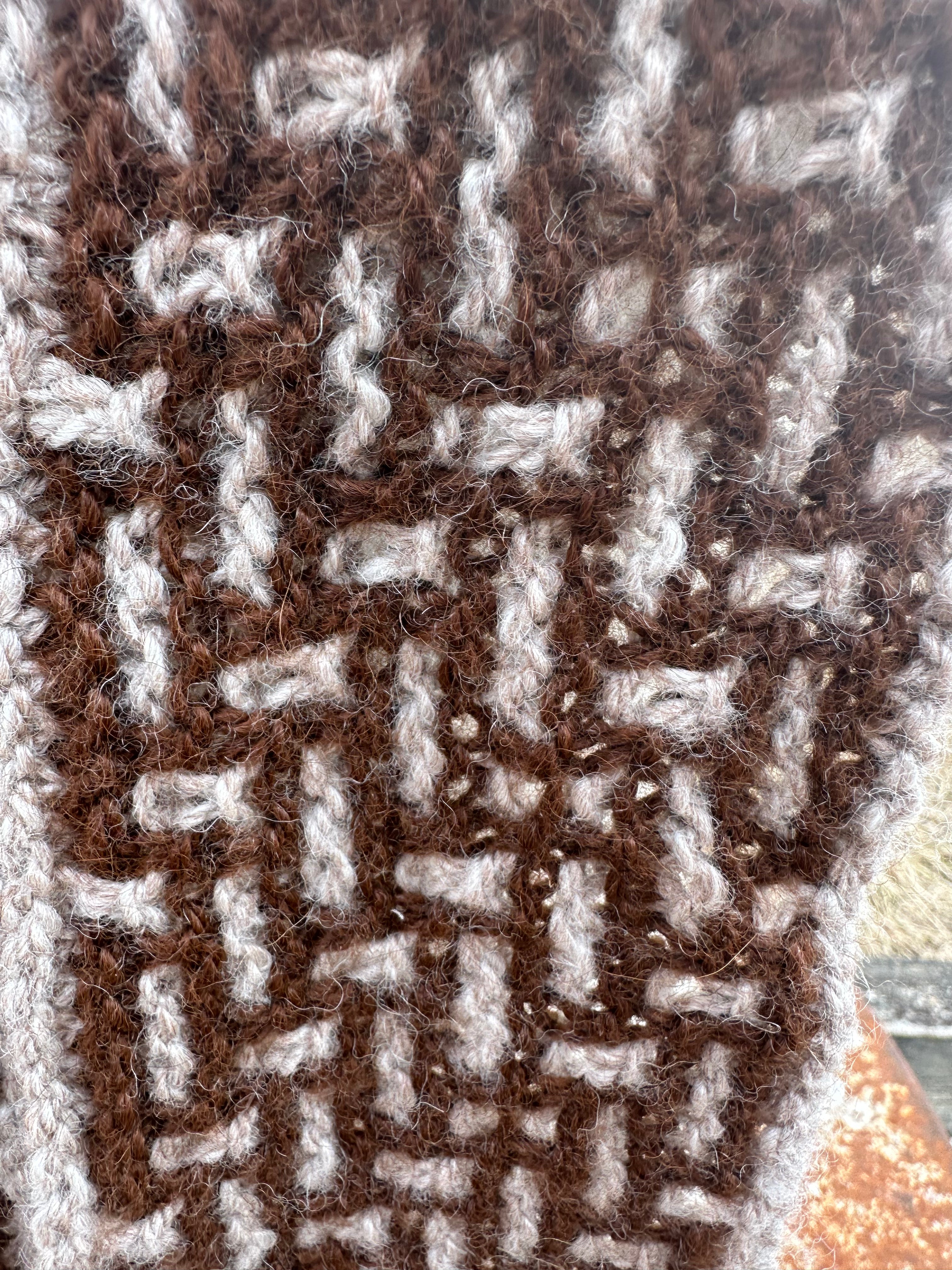 100% USA Alpaca hand knit scarf. Very soft and warm.