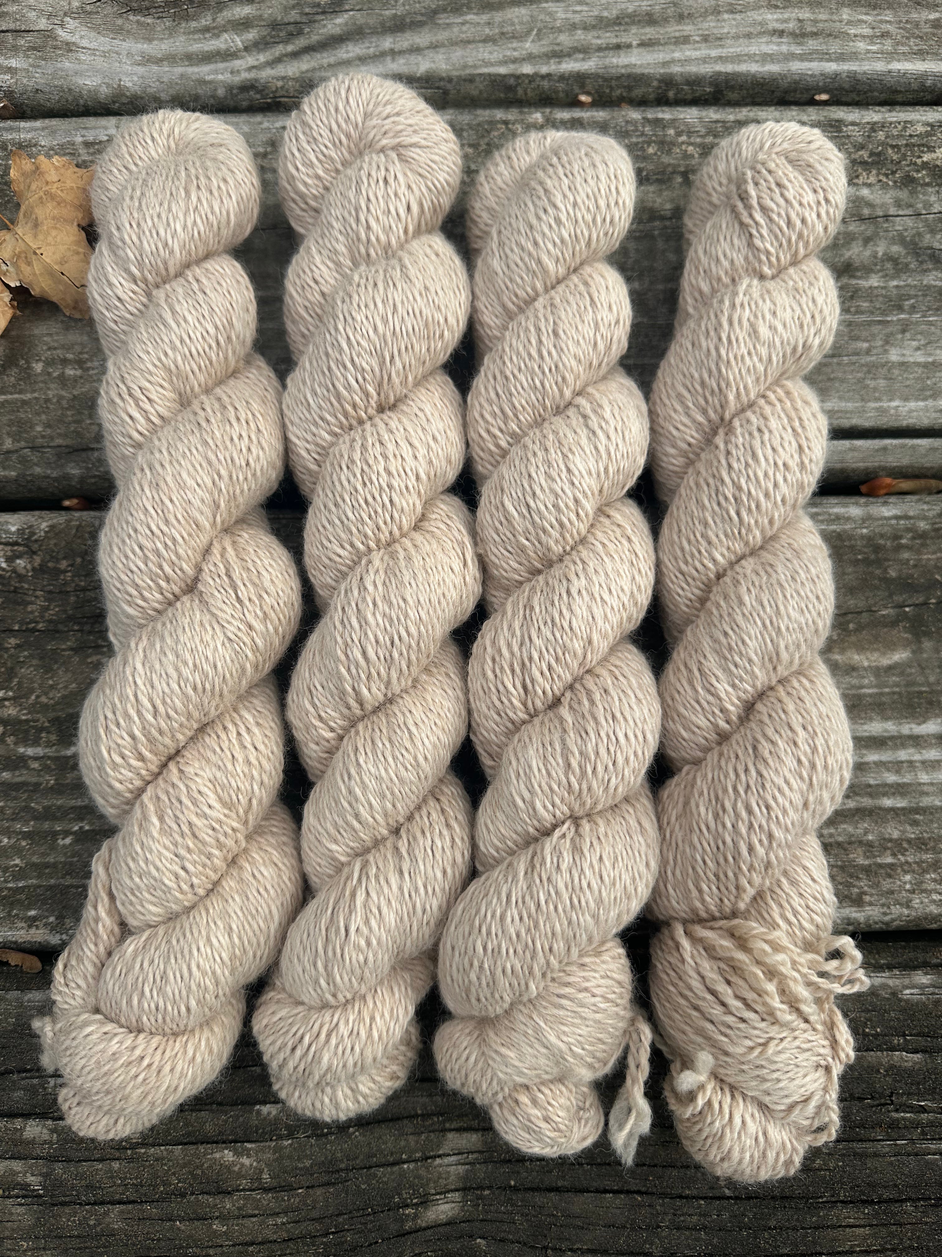 200 yd of DK 100% USA Alpaca from our alpacas, 2 ply.  Natural Colors