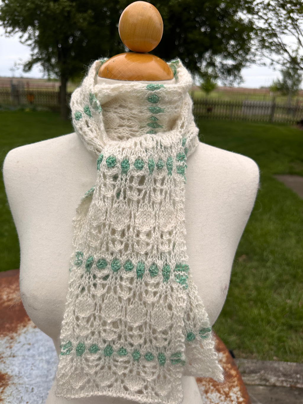 100% USA Alpaca hand knit scarf. Delicate lacey pattern.