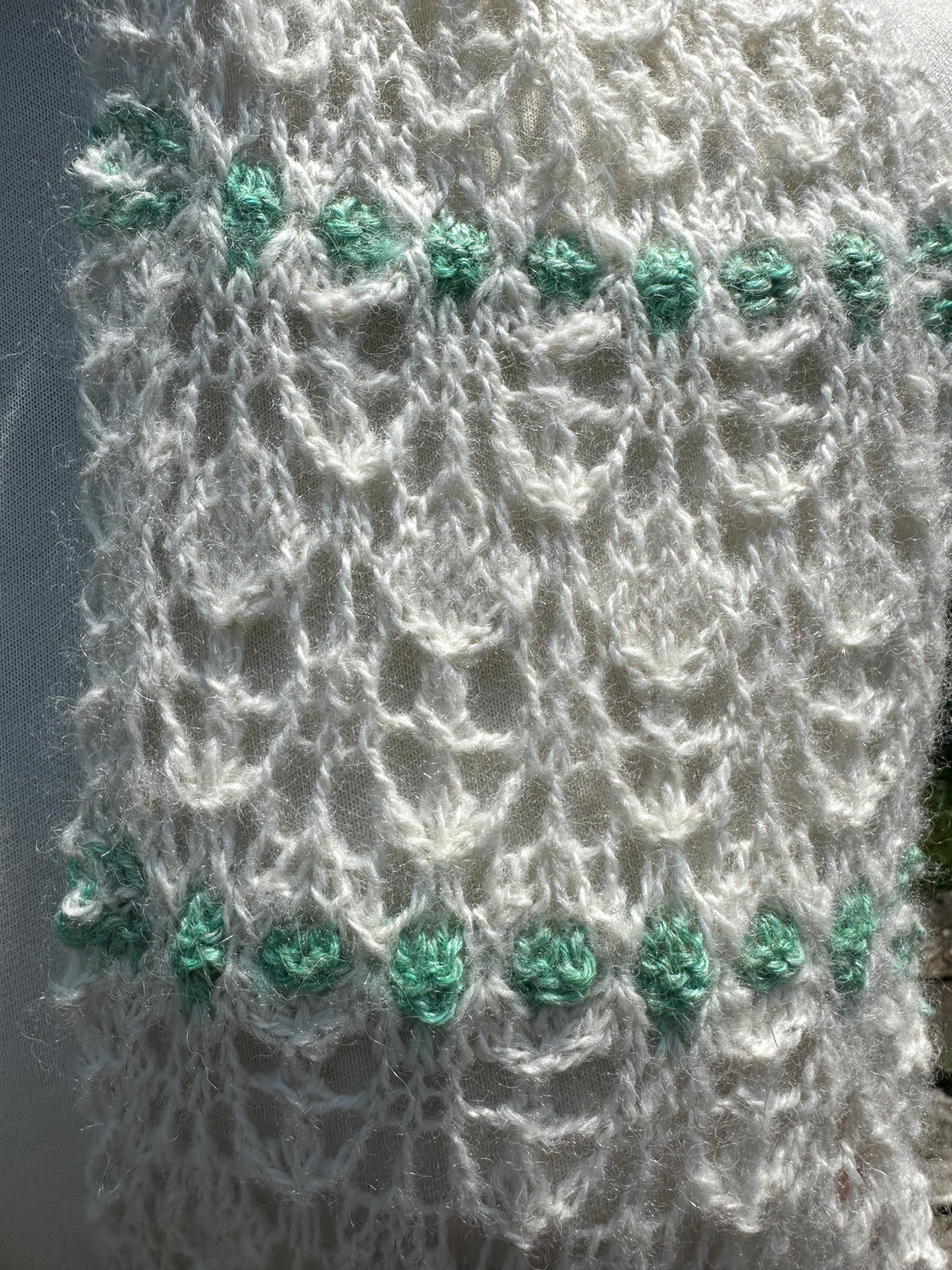 100% USA Alpaca hand knit scarf. Delicate lacey pattern.