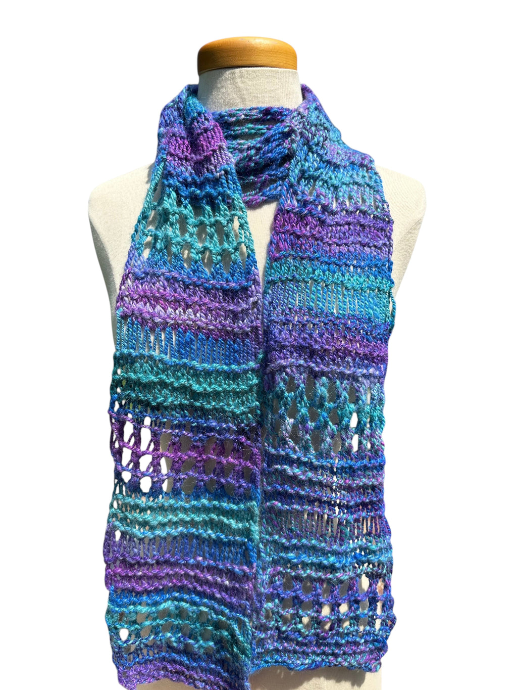 Oak Crest Alpacas and More hand-knit purple and green chunky alpaca yarn scarf with an open lace design.