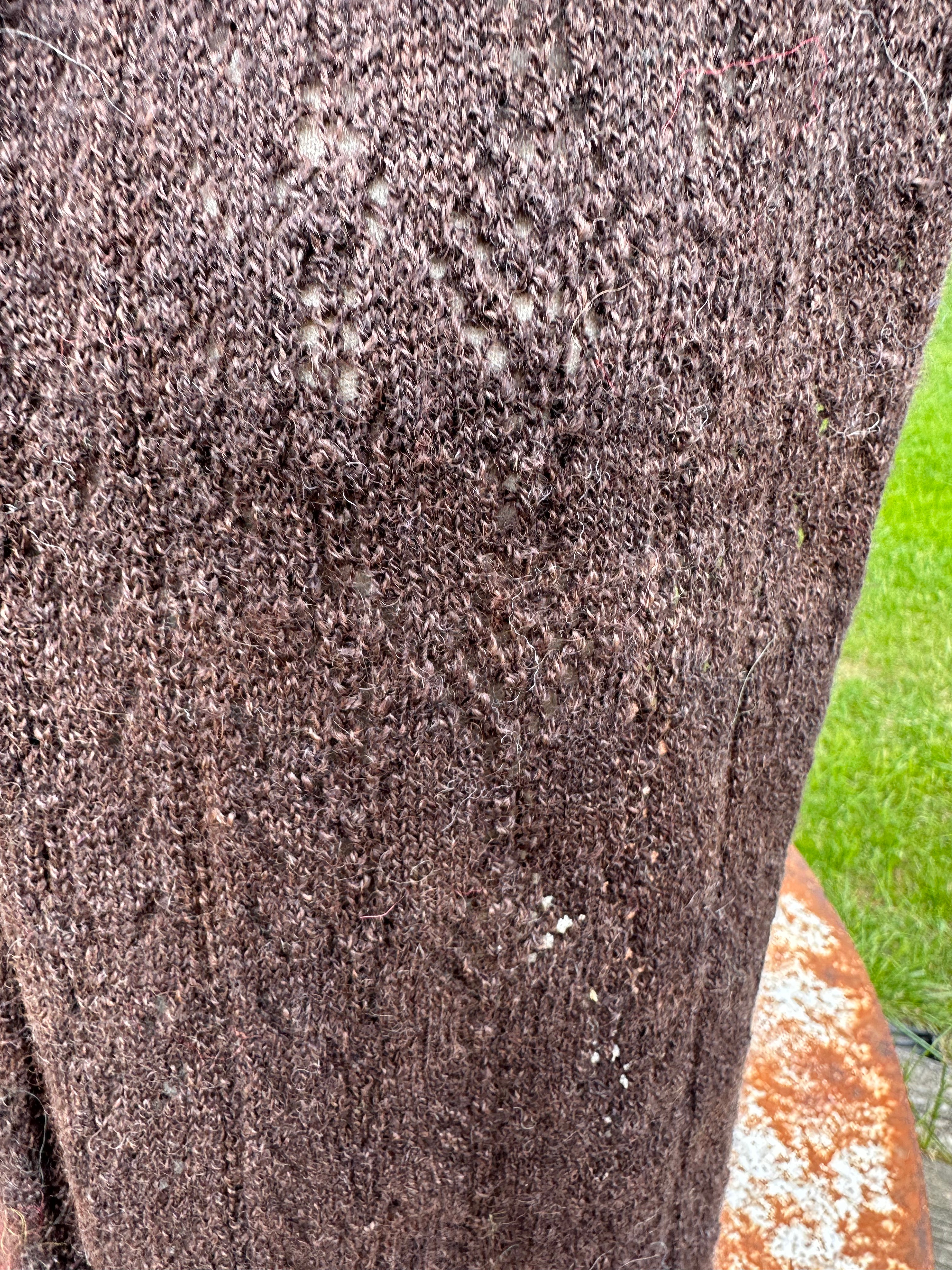 100% USA Alpaca machine knit scarf. Very soft and warm.