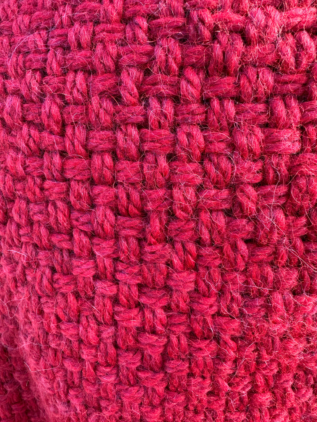 100% Alpaca hand woven shawl with fringe. Very soft and warm.