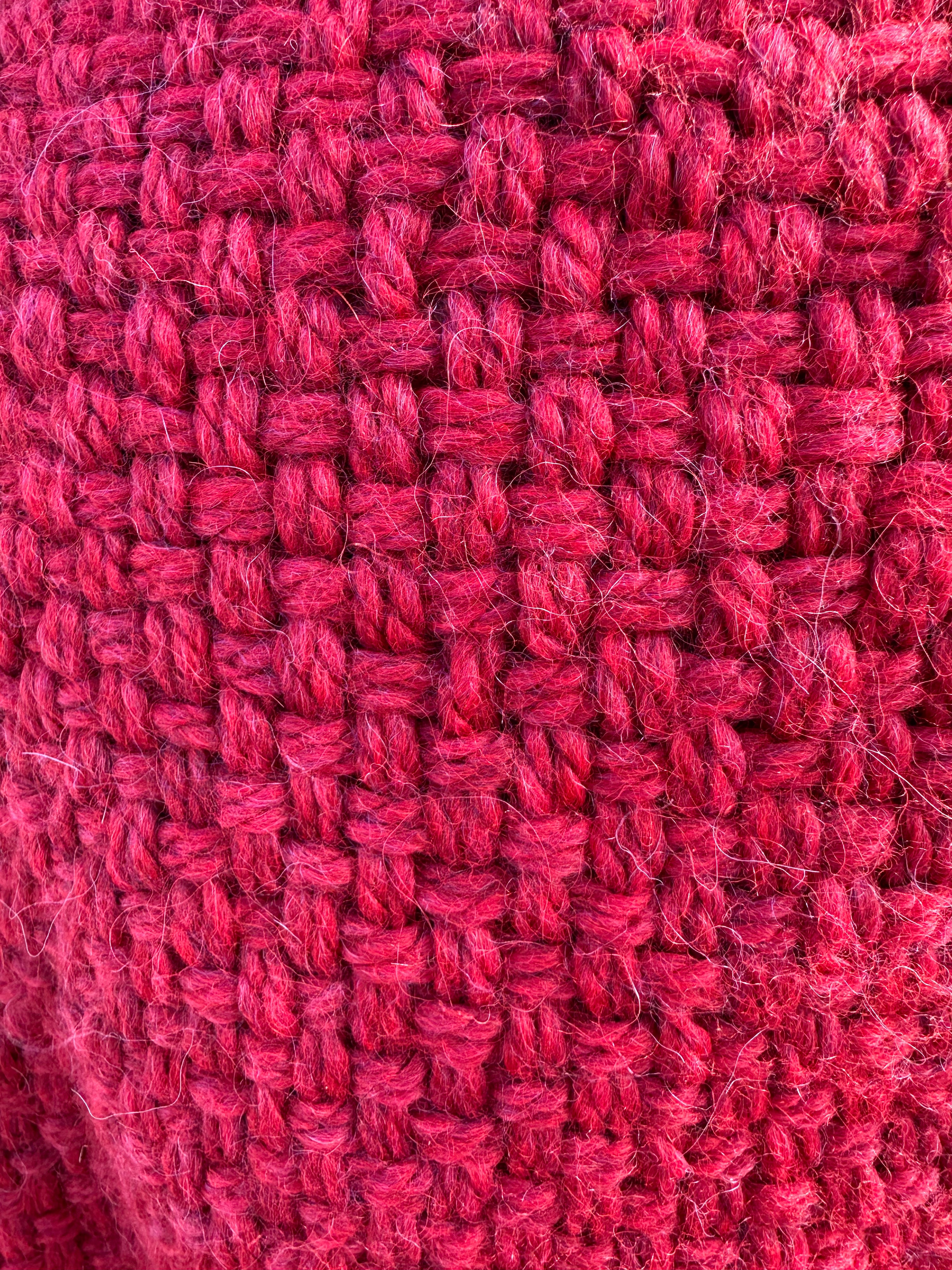 100% Alpaca hand woven shawl with fringe. Very soft and warm.