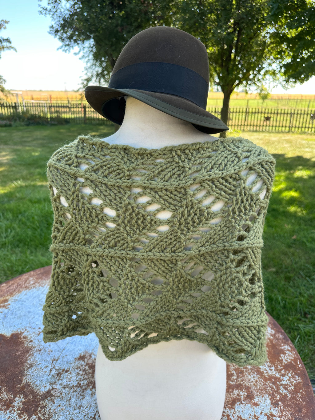Hand knit Llama poncho/wrap. One size fits all.