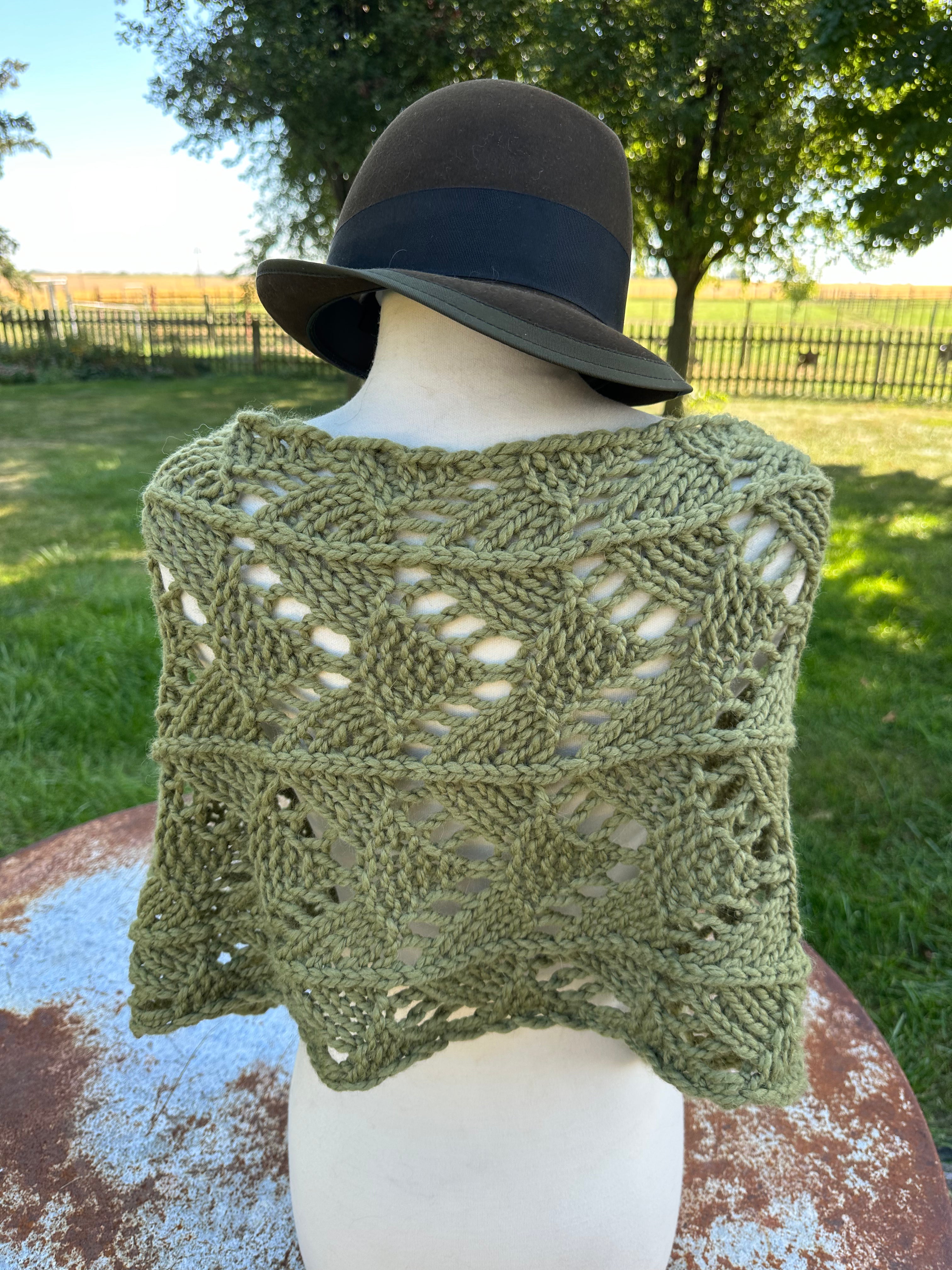 Hand knit Llama poncho/wrap. One size fits all.