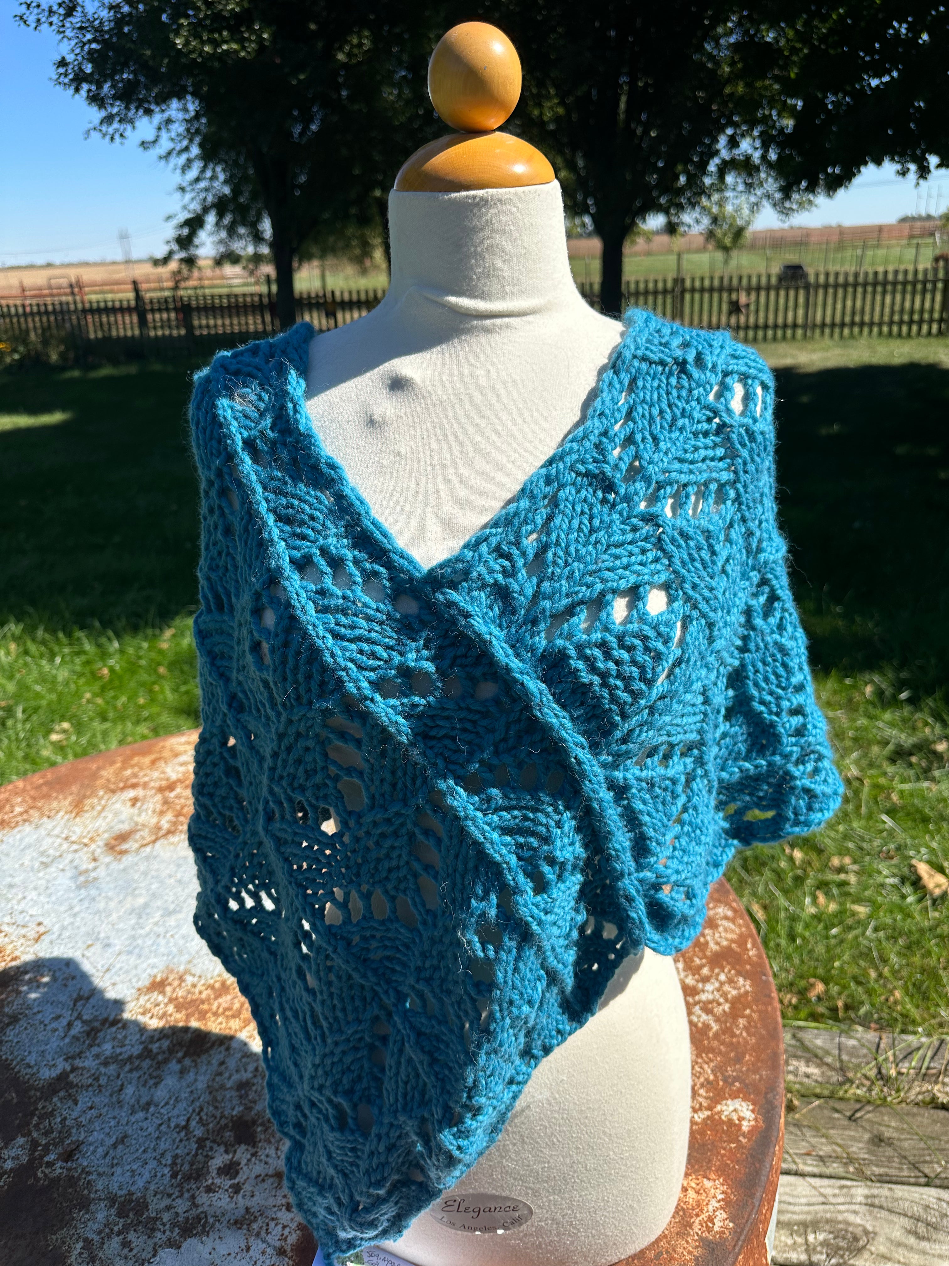 Hand knit Llama poncho/wrap. One size fits all.