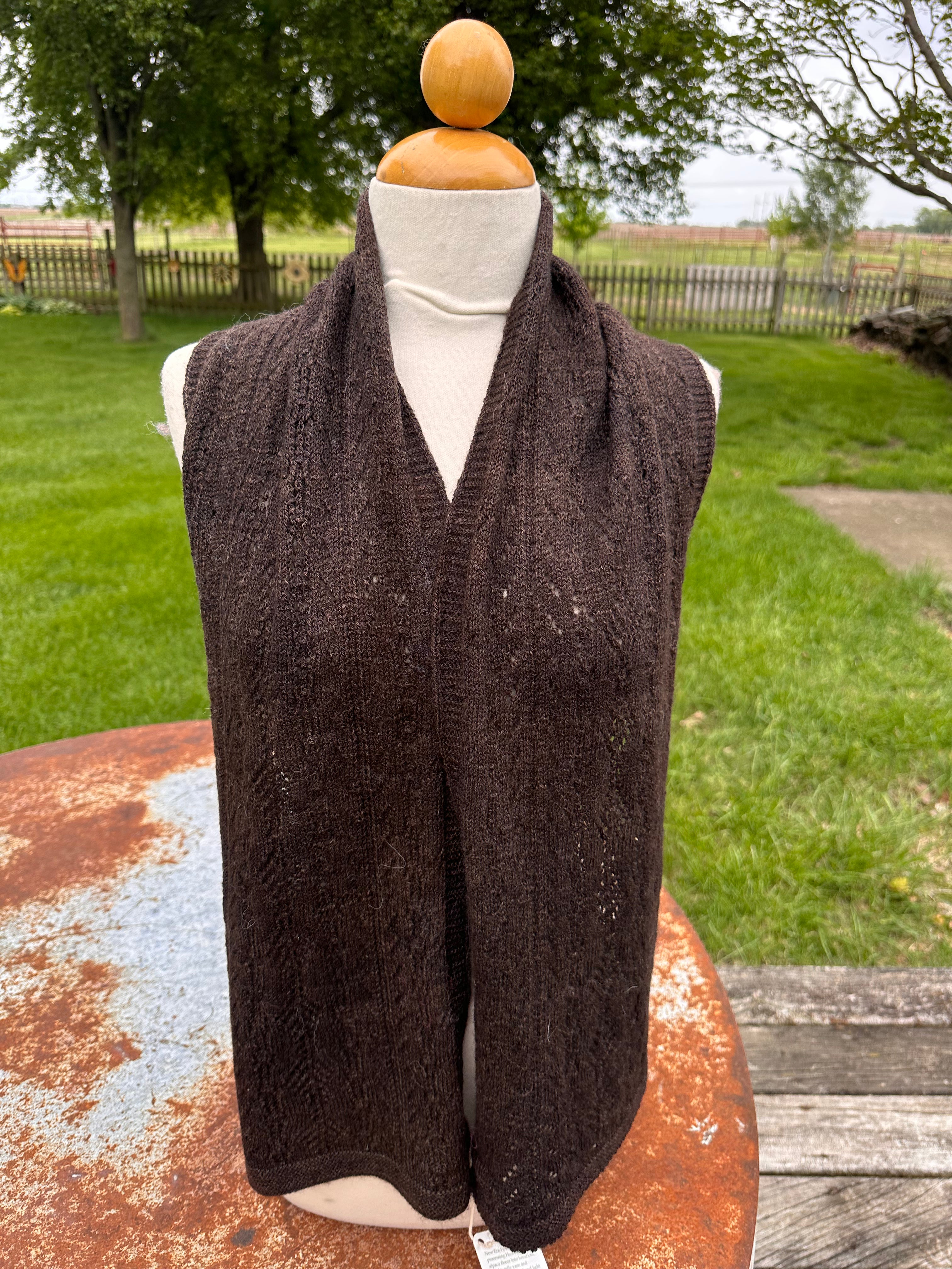 100% USA Alpaca machine knit scarf. Very soft and warm.
