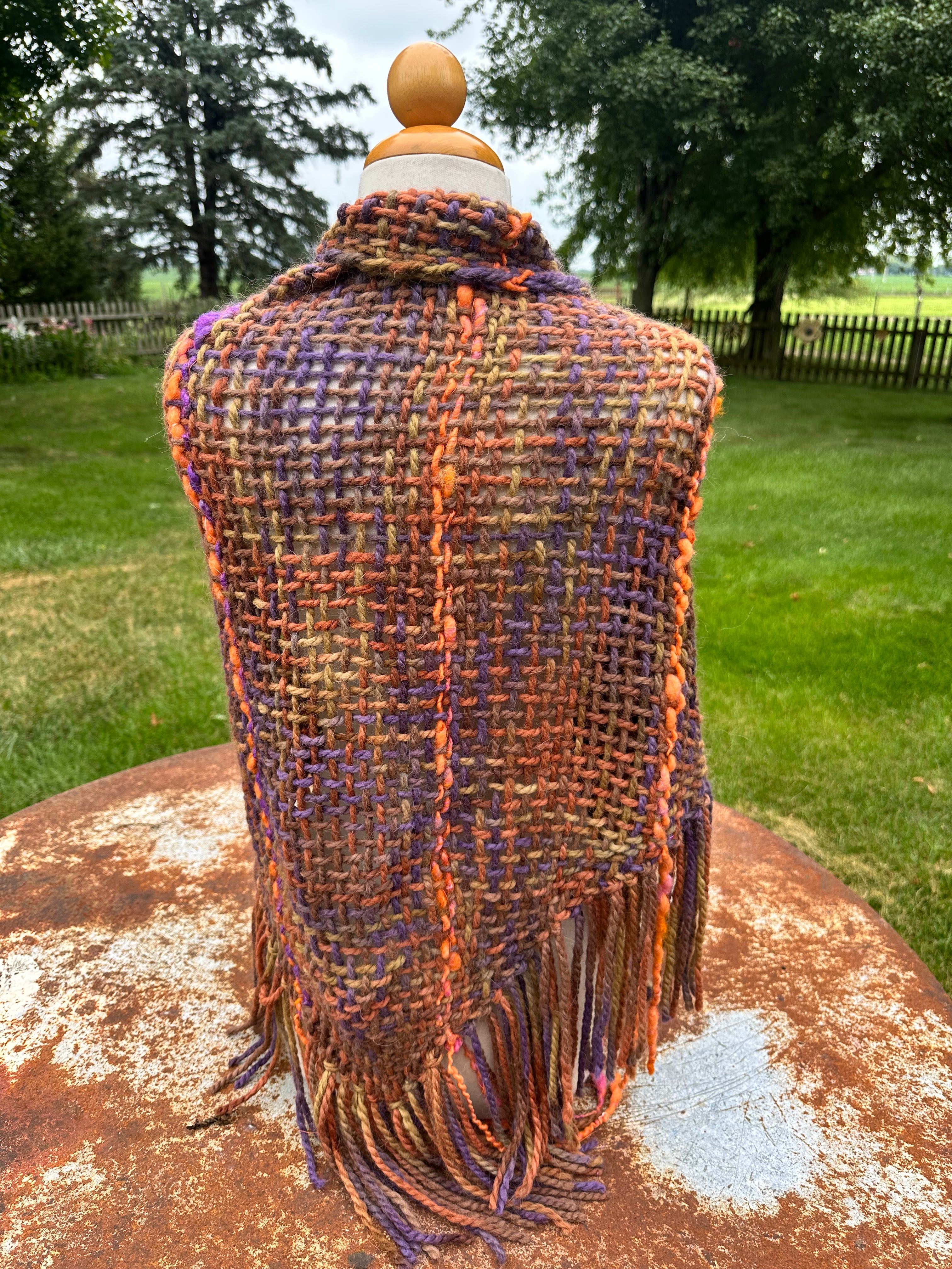 100% Alpaca hand woven shawl with fringe. Very soft and warm.