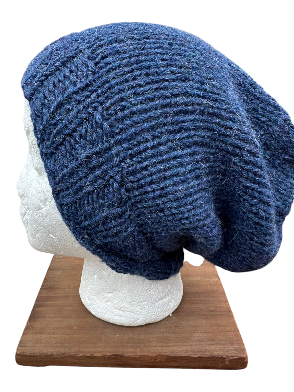 Oak Crest Alpacas and More chunky blue hand knit alpaca slouchy hat on a mannequin head