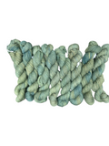 Oak Crest Alpacas and More hand dyed 100% American alpaca DK yarn in variegated sage green and blue tones.