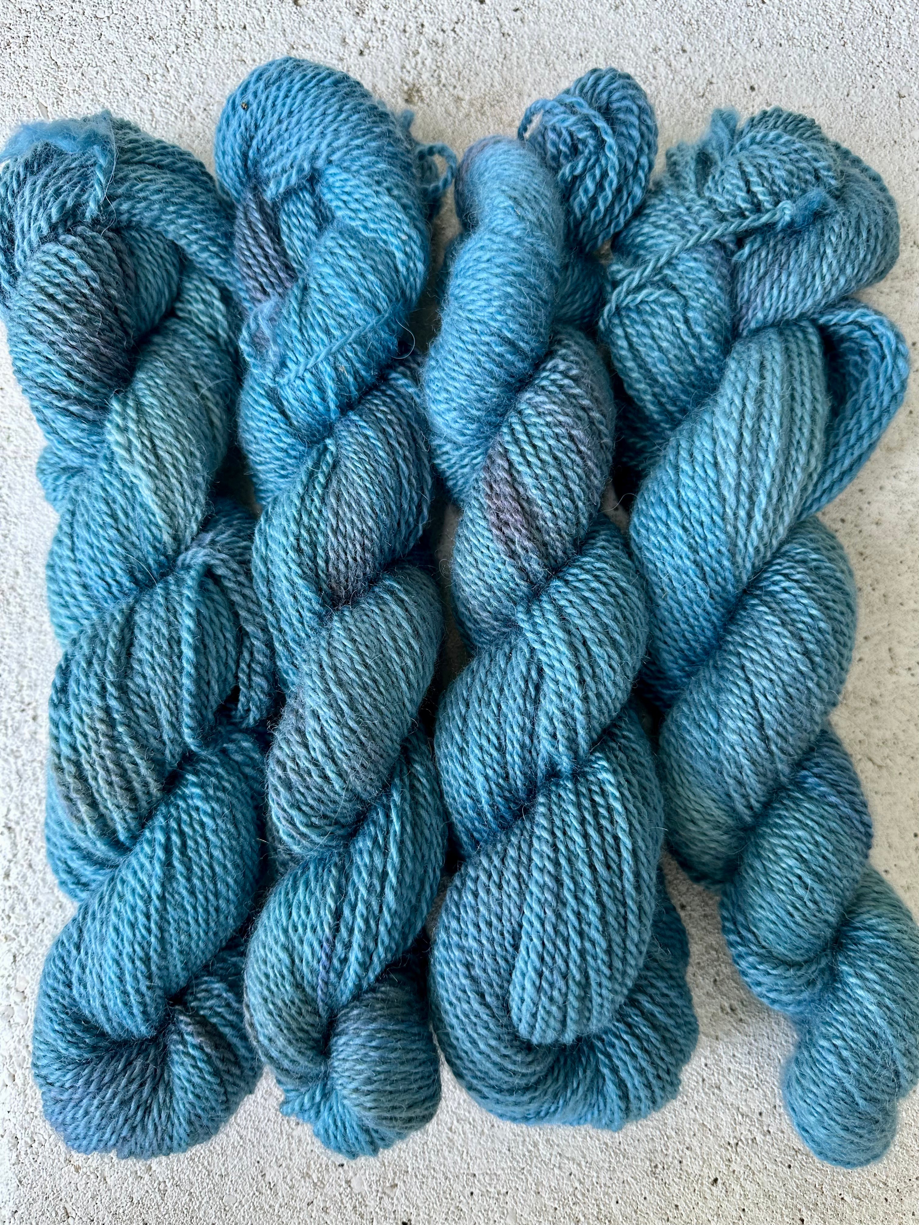 150 yd of Worsted weight 100%  American Alpaca yarn, 2 ply, from our alpacas. Hand dyed.