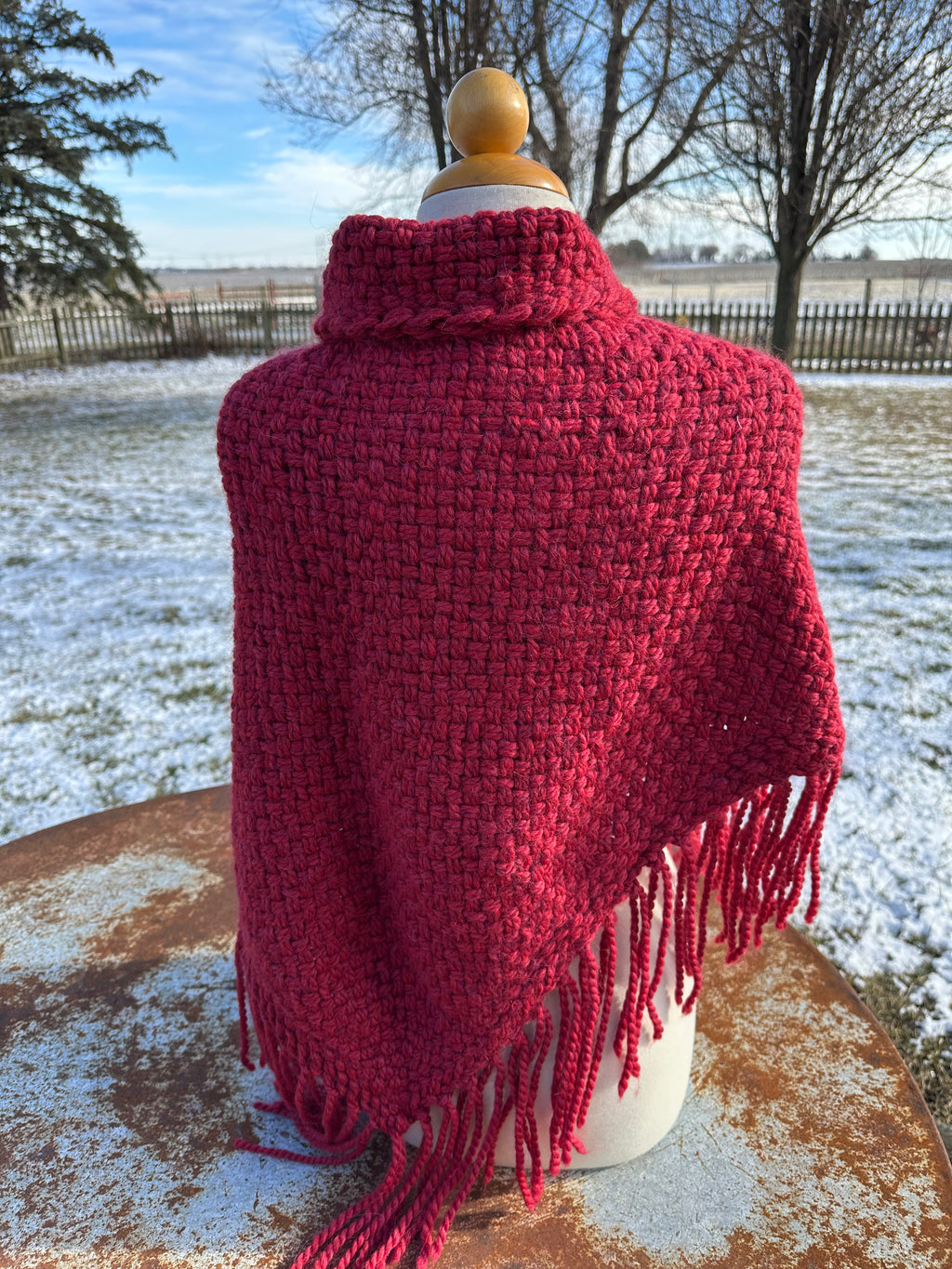 100% Alpaca hand woven shawl with fringe. Very soft and warm.