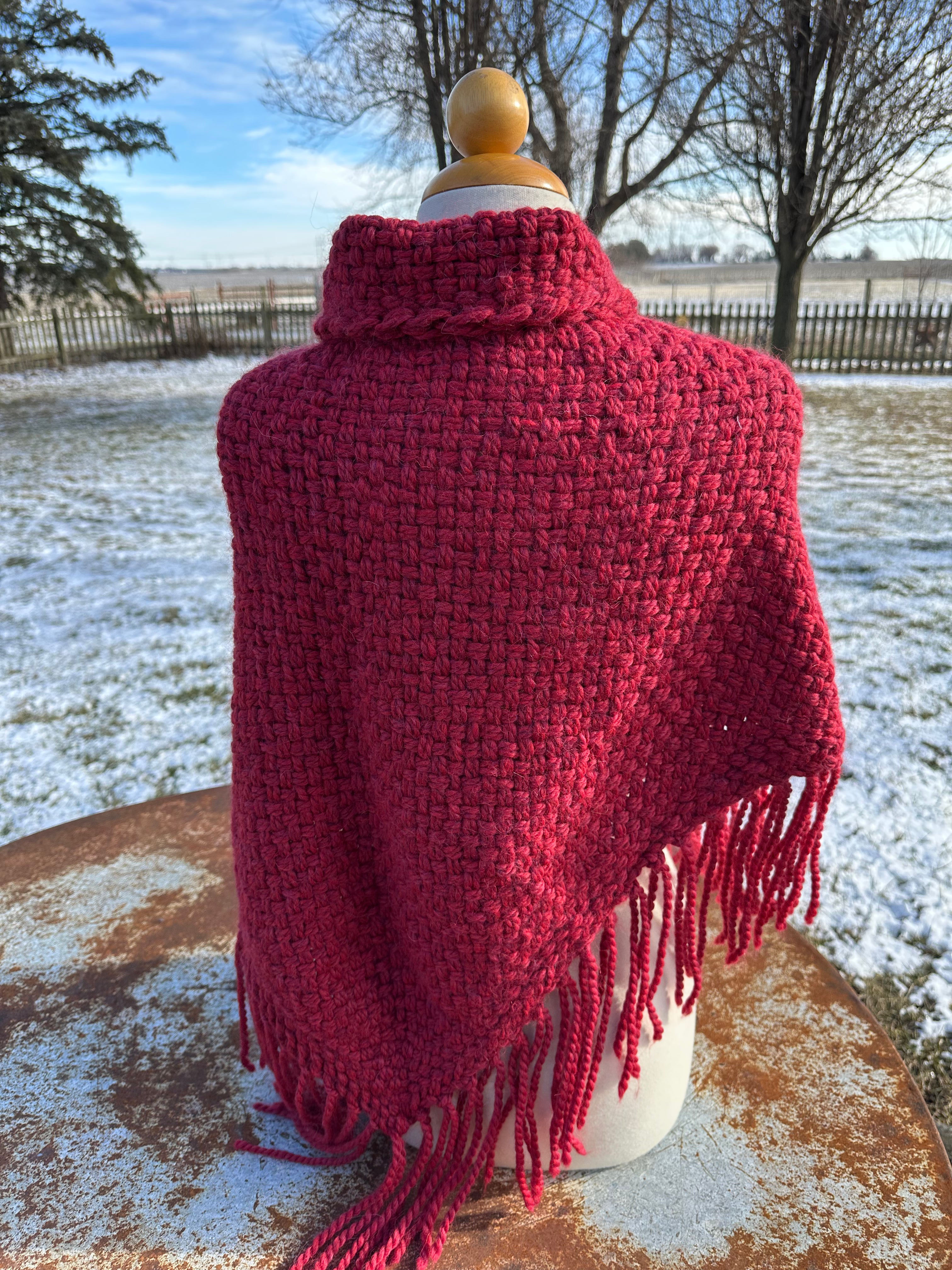 100% Alpaca hand woven shawl with fringe. Very soft and warm.