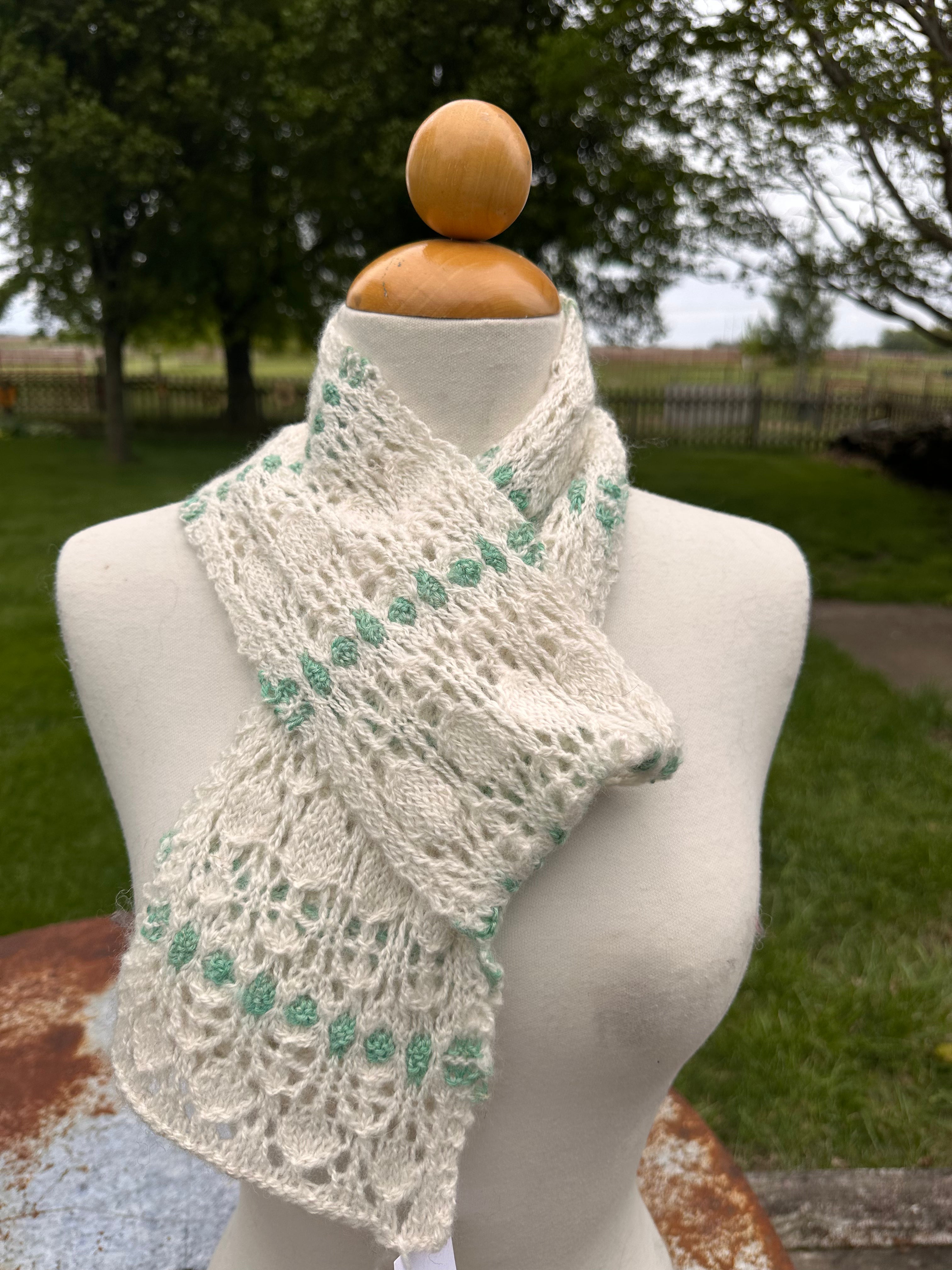 100% USA Alpaca hand knit scarf. Delicate lacey pattern.